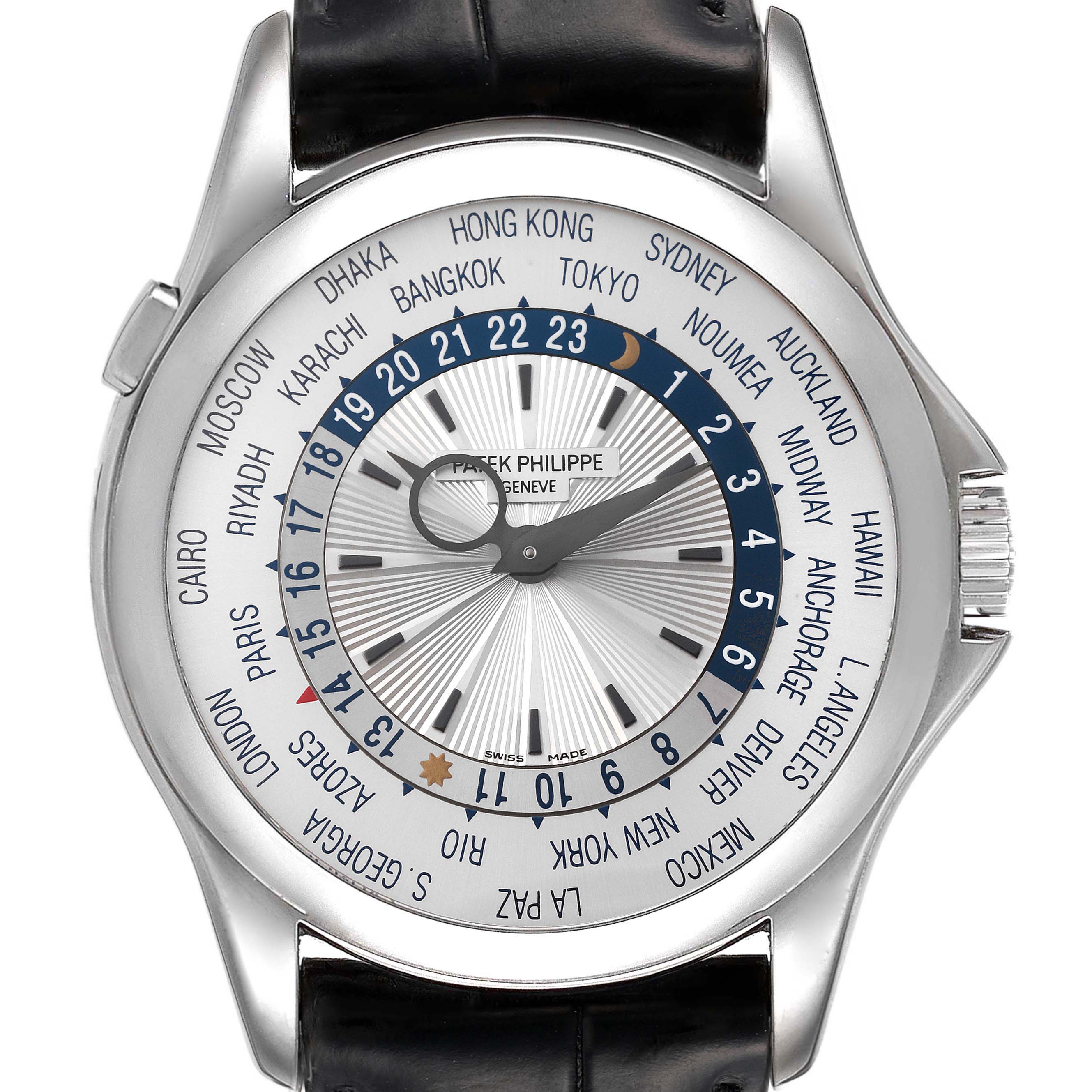 This image shows the face of a Patek Philippe Complications 5130G-019 Men's White Gold Silver Dial 5130G-019 Men's White Gold Silver Dial model, displaying world time zones and a night/day indicator.