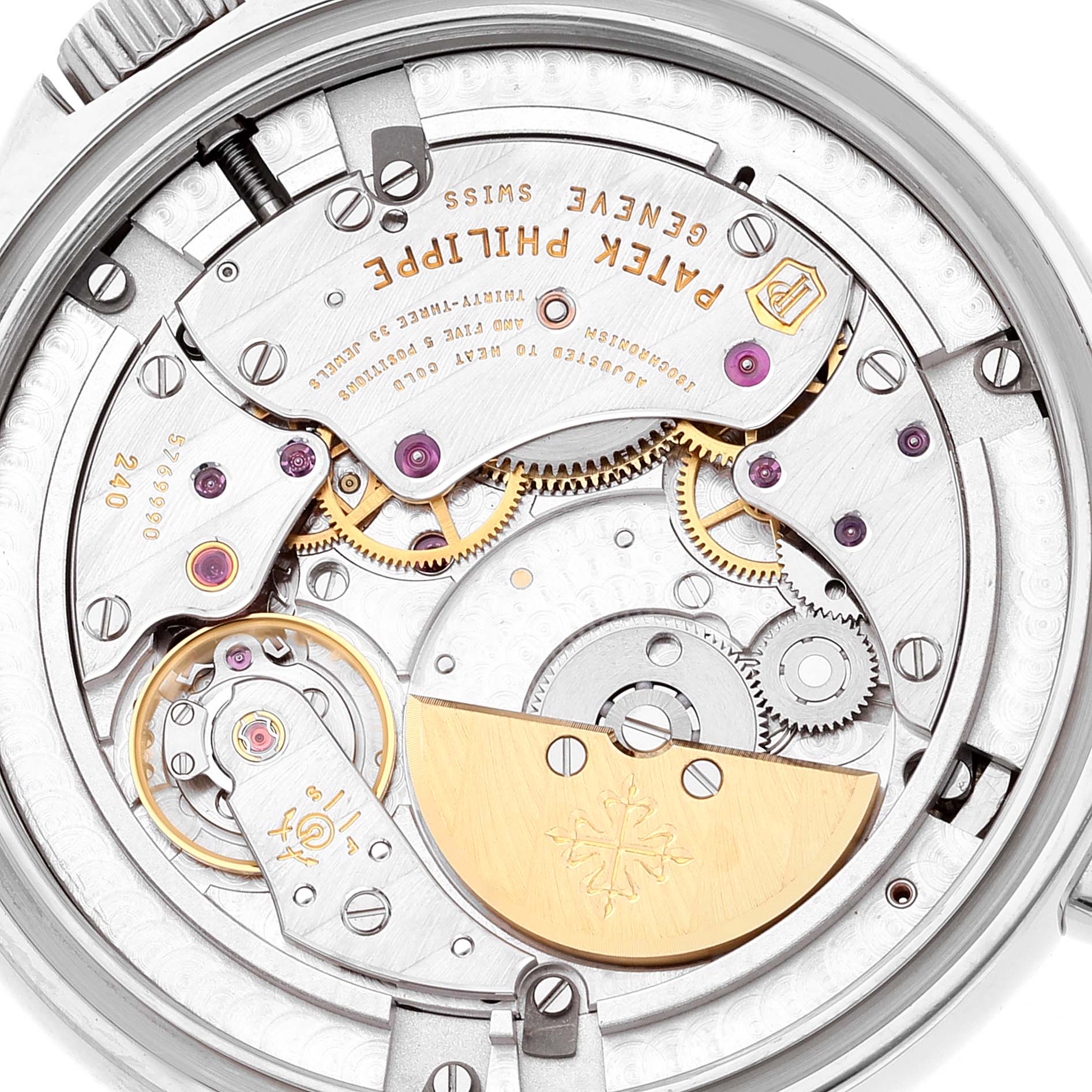 This image shows the intricate mechanical movement of the Patek Philippe Complications 5130G-019 Men's White Gold Silver Dial 5130G-019 Men's White Gold Silver Dial watch from the back angle.