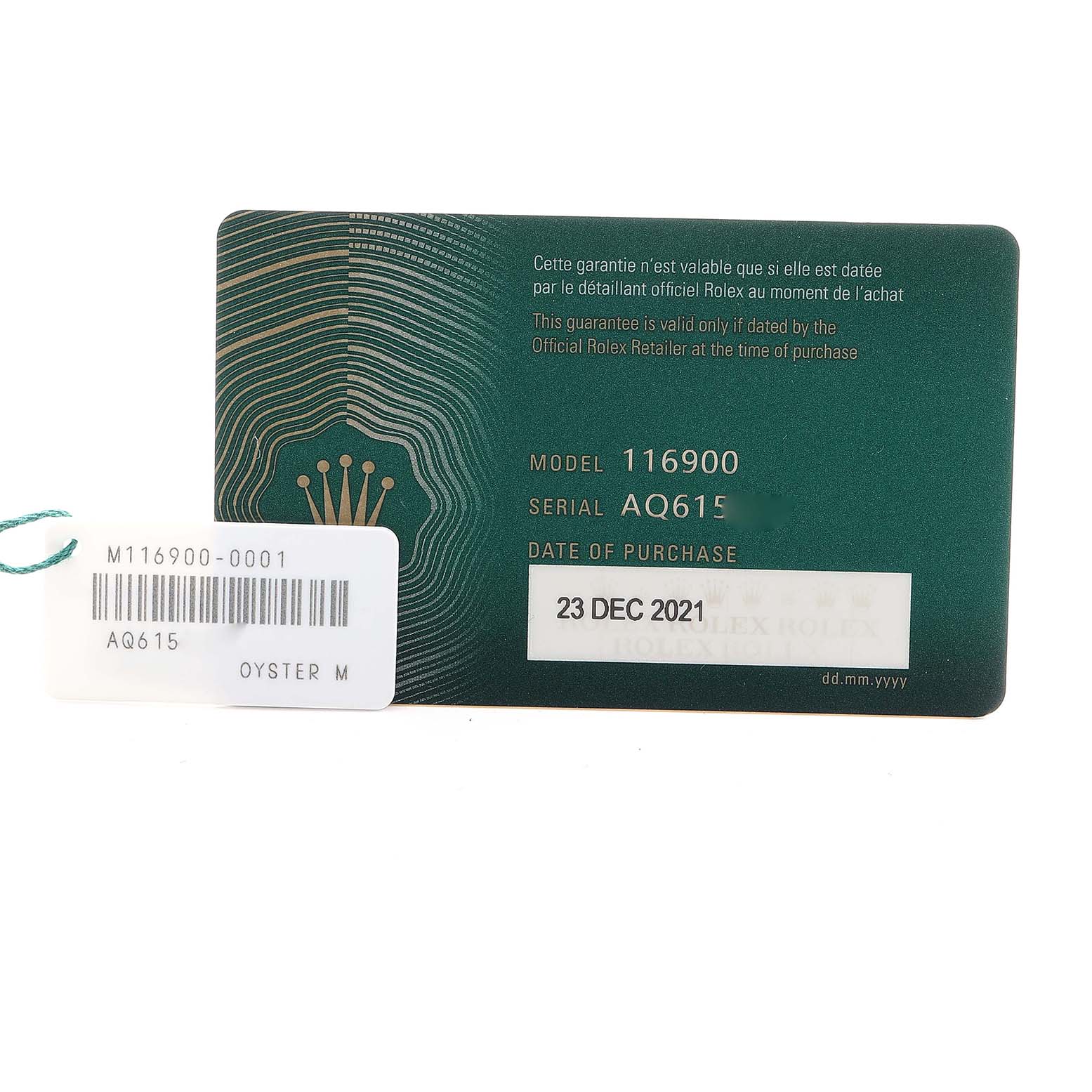The image shows the warranty card and tag for a Rolex Air-King 116900 Men
s Stainless Steel Black Dial model 116900, displaying model number and purchase date.