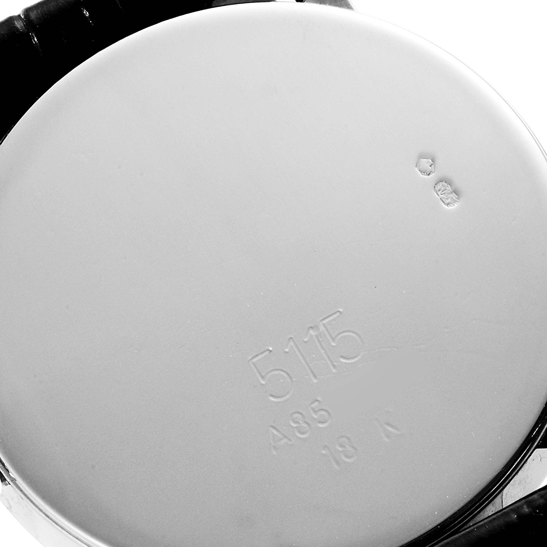 The image shows the back case view of the Rolex Cellini 5115 Men's White Gold Brown Dial 5115 Men's White Gold Brown Dial model watch, displaying its engravings and part of the strap.