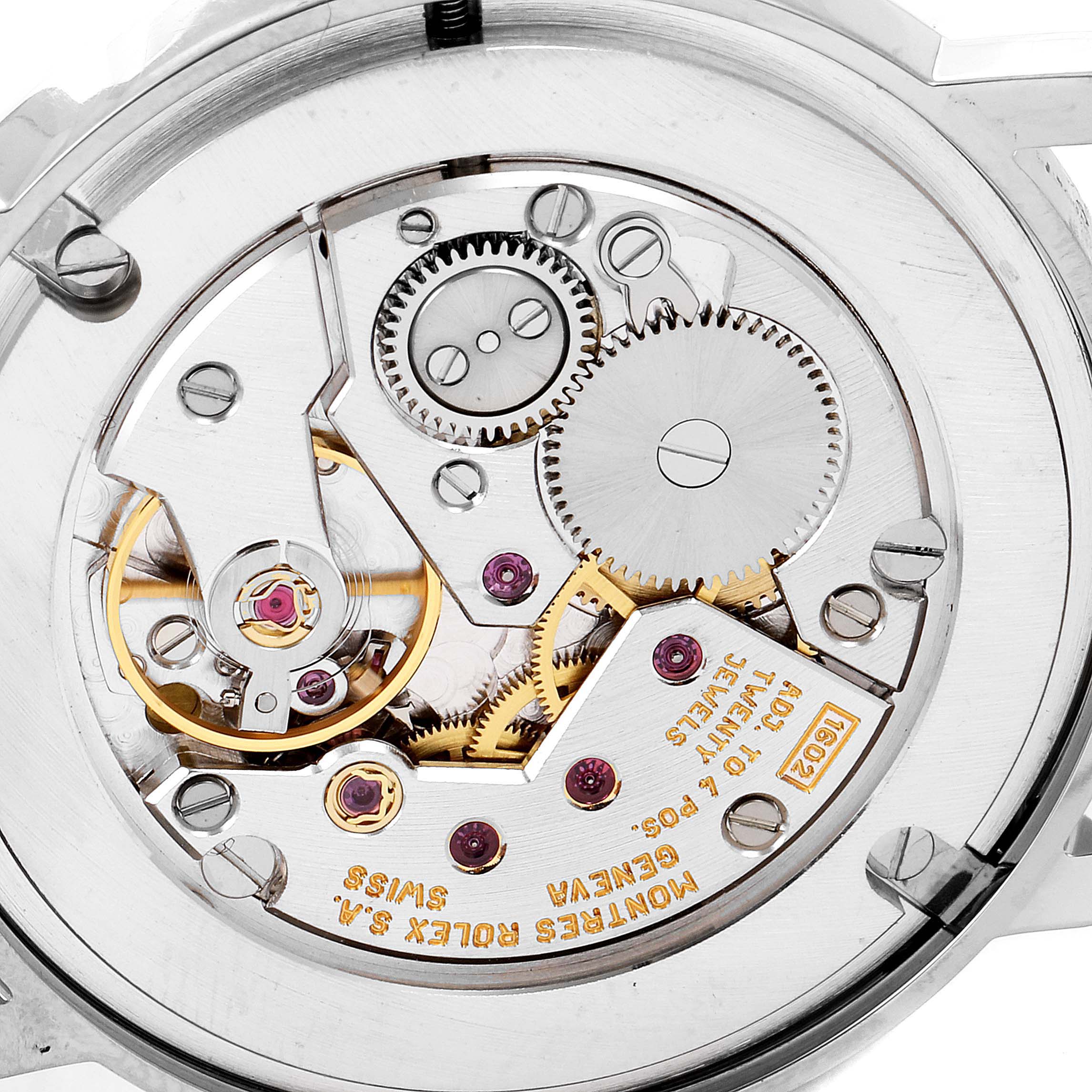 The image shows a close-up of the movement and internal mechanism of a Rolex Cellini 5115 Men's White Gold Brown Dial 5115 Men's White Gold Brown Dial watch.
