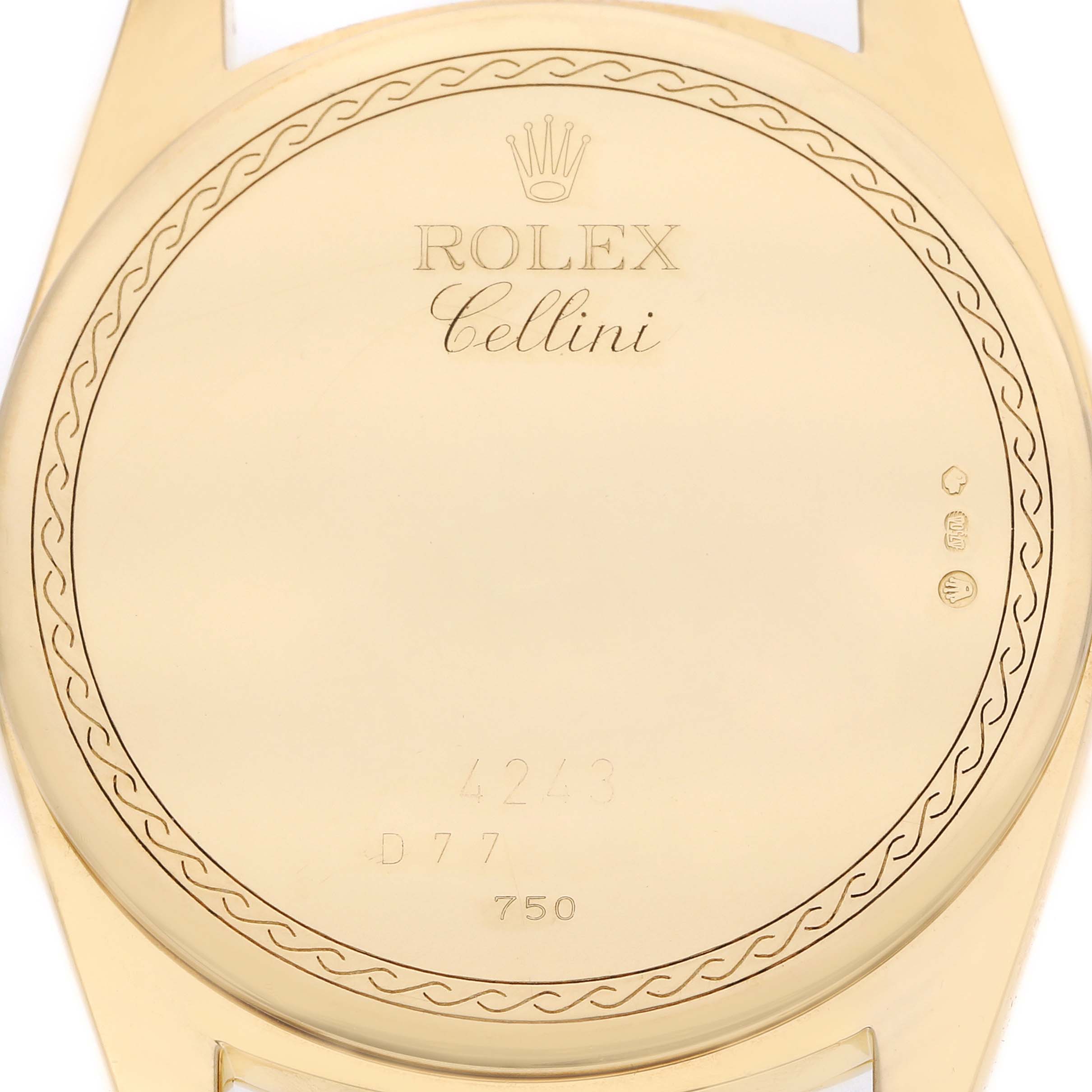The image shows the back of the Rolex Cellini 4243 Men
s Yellow Gold Champagne Dial watch, highlighting the engraved logo and model details.