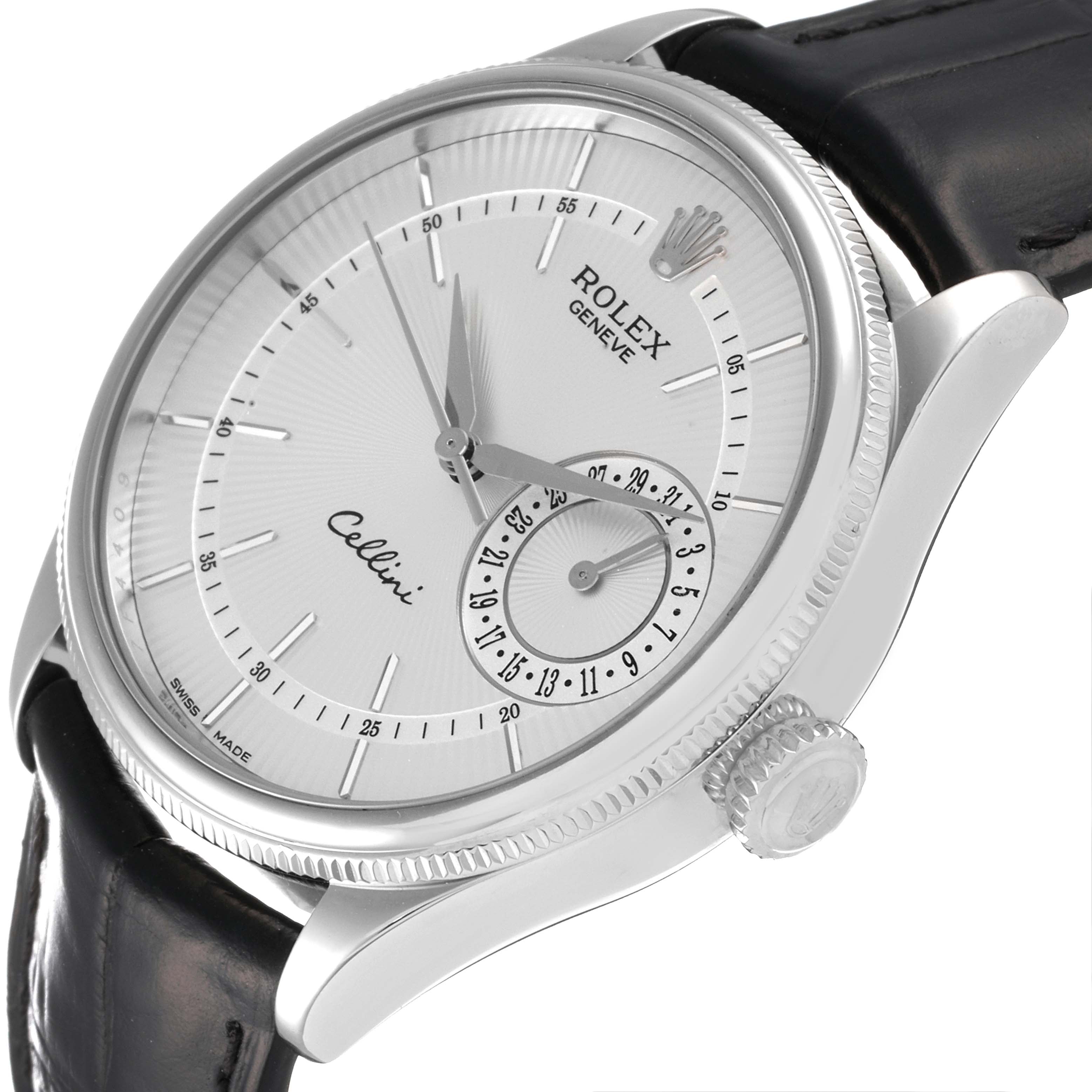 The image shows a side view of a Rolex Cellini 50519 Men
s White Gold Silver Dial 50519 Men
s White Gold Silver Dial watch emphasizing its dial, crown, and part of the leather strap.