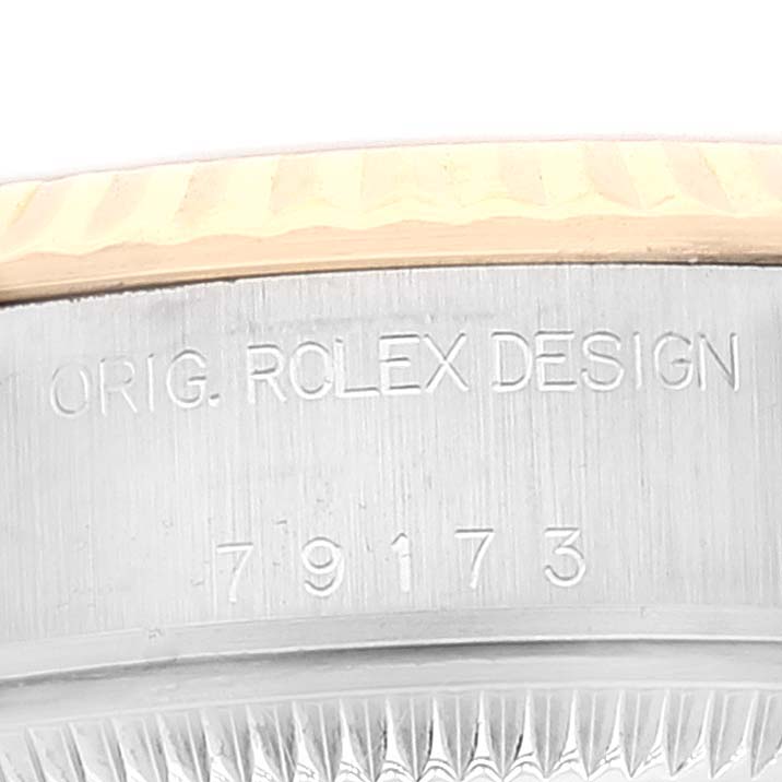 This image shows a close-up of the case back engraving of a Rolex Datejust 79173 Women's Steel and Gold (two tone) White Dial 79173 Women's Steel and Gold (two tone) White Dial watch, displaying the model number 79173.