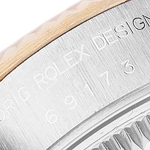 This is a close-up of the side engraving on the Rolex Datejust 69173 Women's Steel and Gold (two tone) Champagne Dial 69173 Women's Steel and Gold (two tone) Champagne Dial watch case.