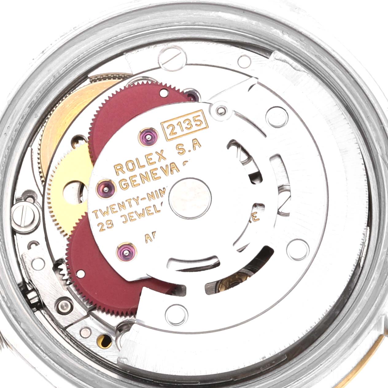 This image shows the internal movement mechanism of a Rolex Datejust 69173 Women's Steel and Gold (two tone) Champagne Dial 69173 Women's Steel and Gold (two tone) Champagne Dial watch, displaying gears and the inscription.