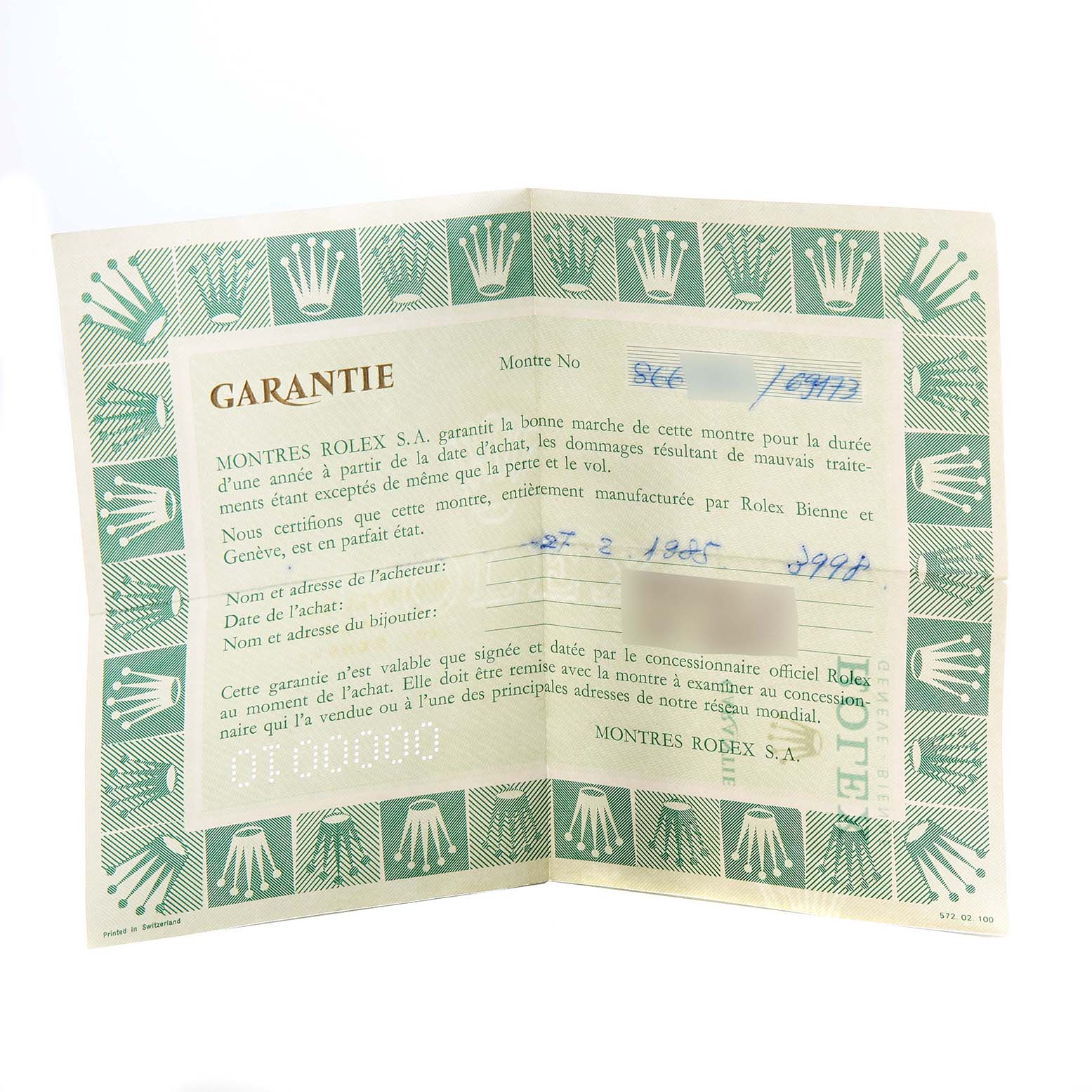 This image shows the warranty certificate for a Rolex Datejust 69173 Women's Steel and Gold (two tone) White Dial 69173 Women's Steel and Gold (two tone) White Dial watch, presented at an angled view.