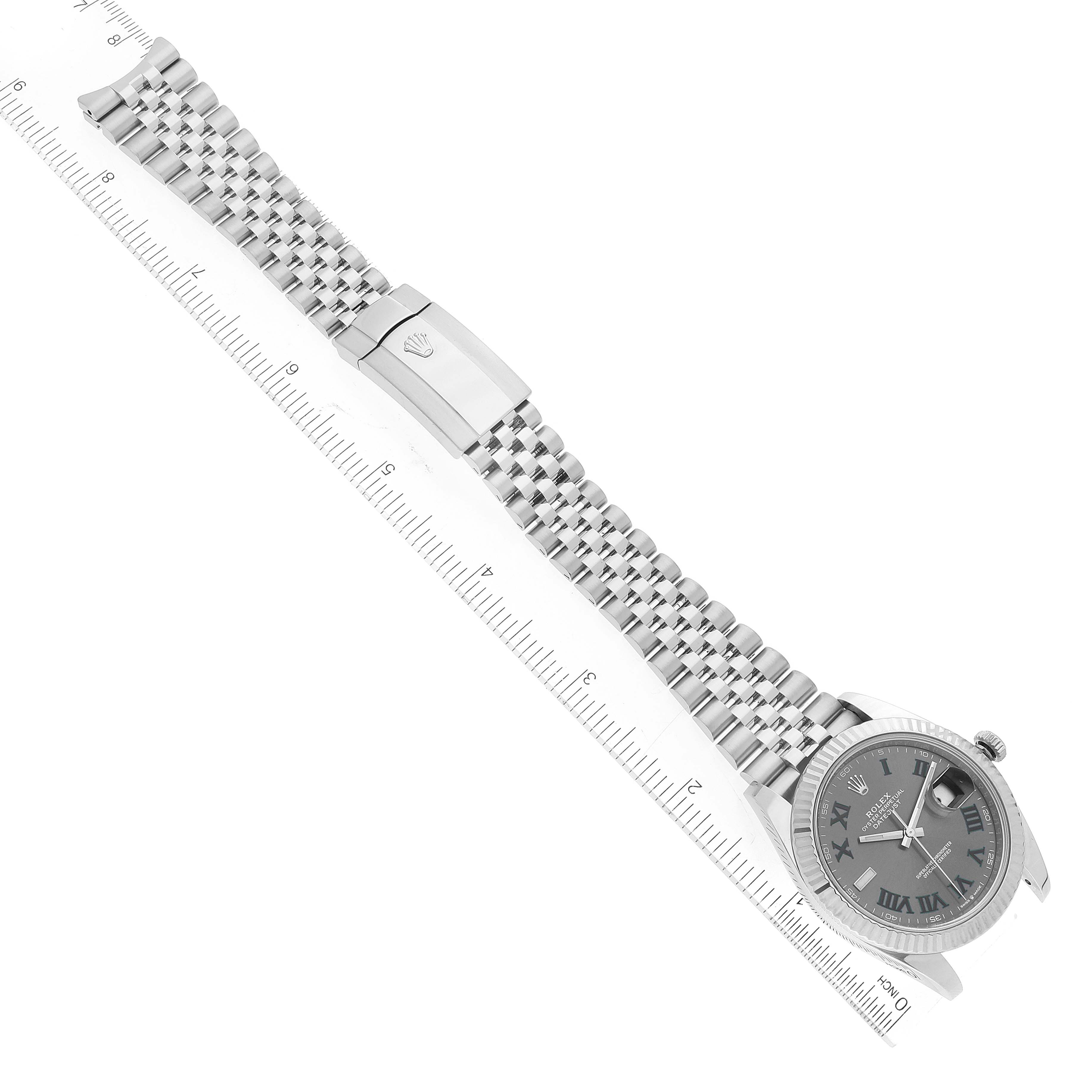 The image shows a top-down view of the Rolex Datejust 41 126334 Men's Stainless Steel Grey Dial 126334 Men's Stainless Steel Grey Dial watch, displaying the face, bezel, bracelet, and clasp alongside a ruler.