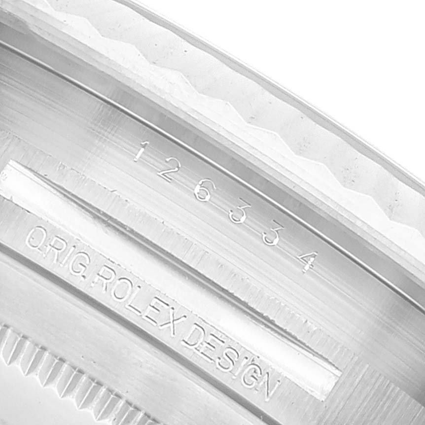 This image shows a close-up of the side engravings on the case of a Datejust 41 model by Rolex.