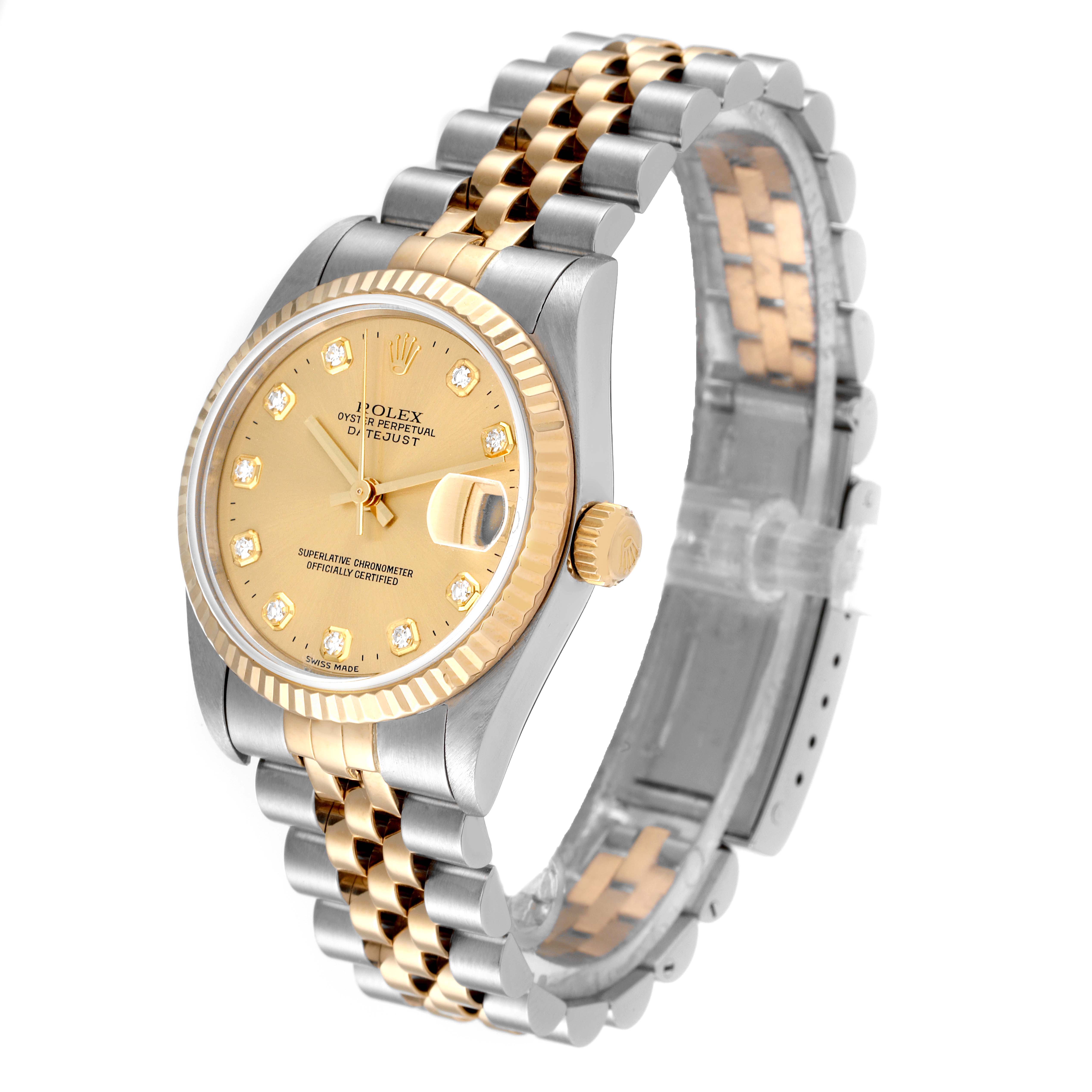 The image shows a Rolex Mid-Size 78273 Women
s Steel and Gold (two tone) Champagne Dial 78273 Women
s Steel and Gold (two tone) Champagne Dial Datejust watch at an angle highlighting its face, bezel, crown, and two-tone jubilee bracelet.