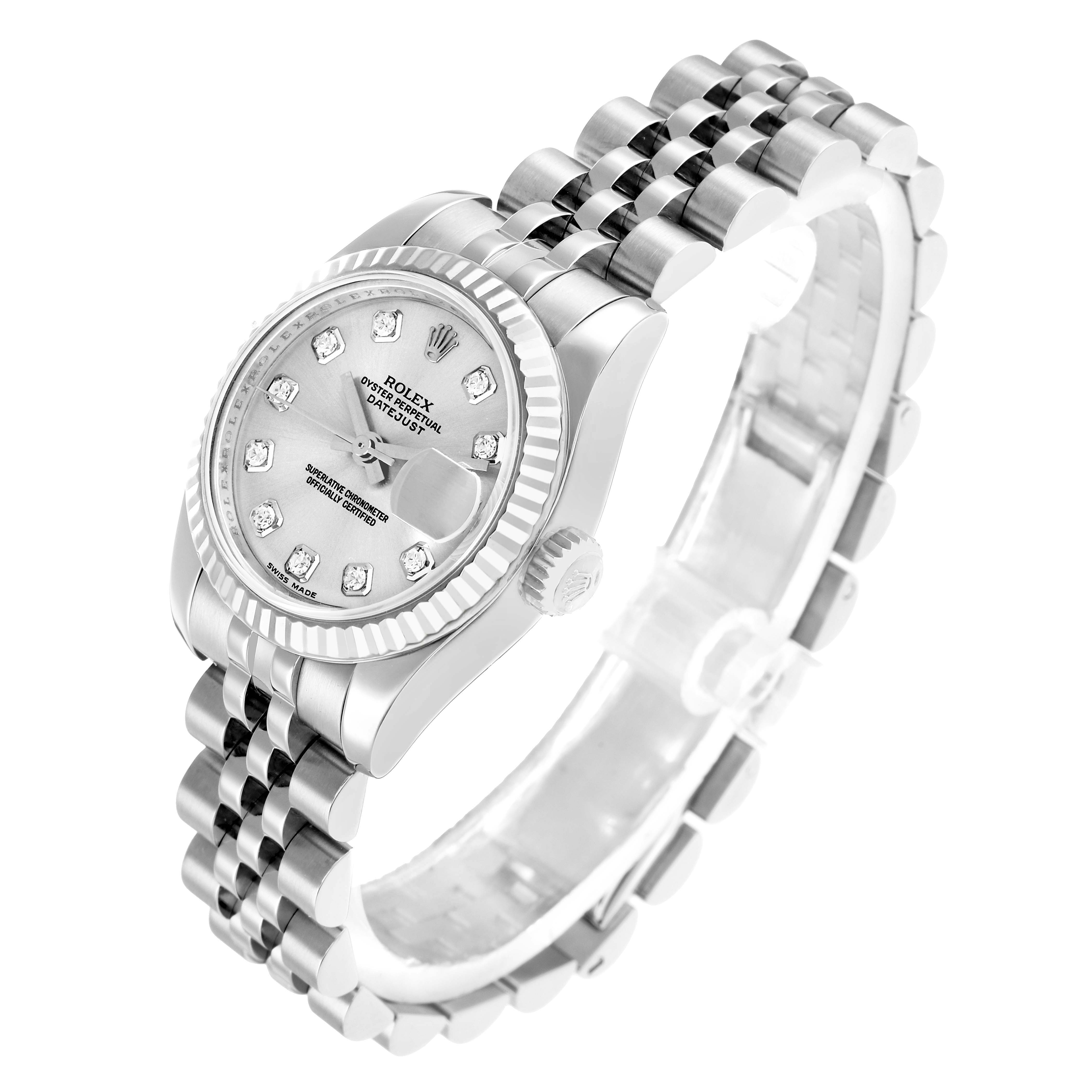 The Rolex Datejust 179174 Women
s Stainless Steel Silver Dial watch is shown from an angled top view, highlighting the dial, fluted bezel, and Jubilee bracelet.