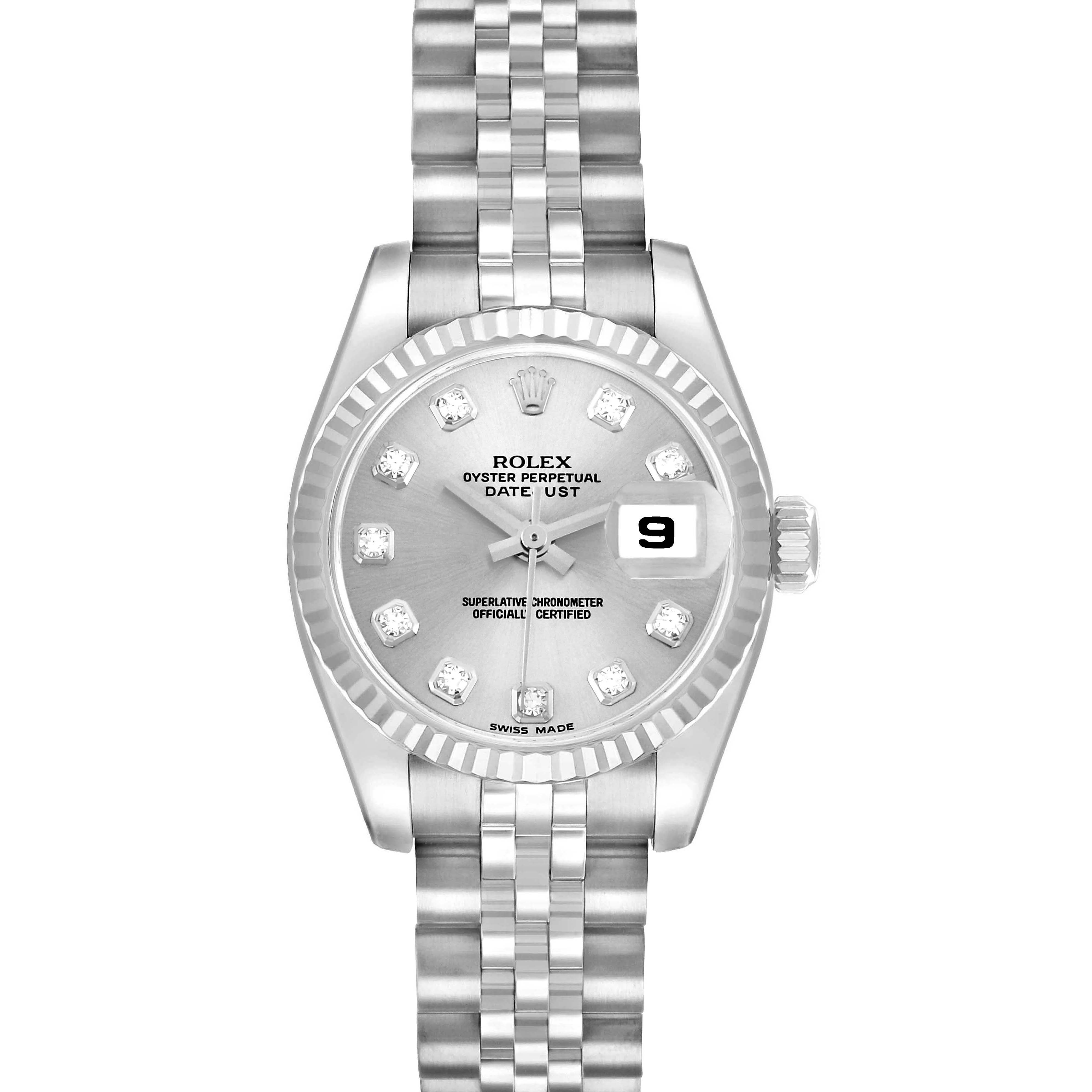 The Rolex Datejust 179174 Women
s Stainless Steel Silver Dial watch is shown from a front angle, displaying its face, fluted bezel, bracelet, and date window.