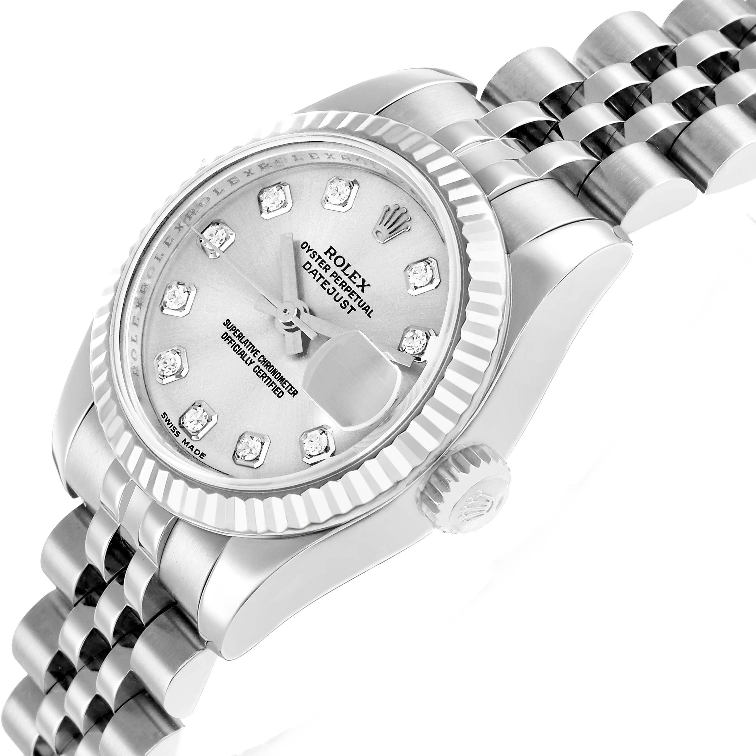 The Rolex Datejust 179174 Women
s Stainless Steel Silver Dial watch is shown at an angled close-up, highlighting the dial, bezel, crown, and part of the bracelet.