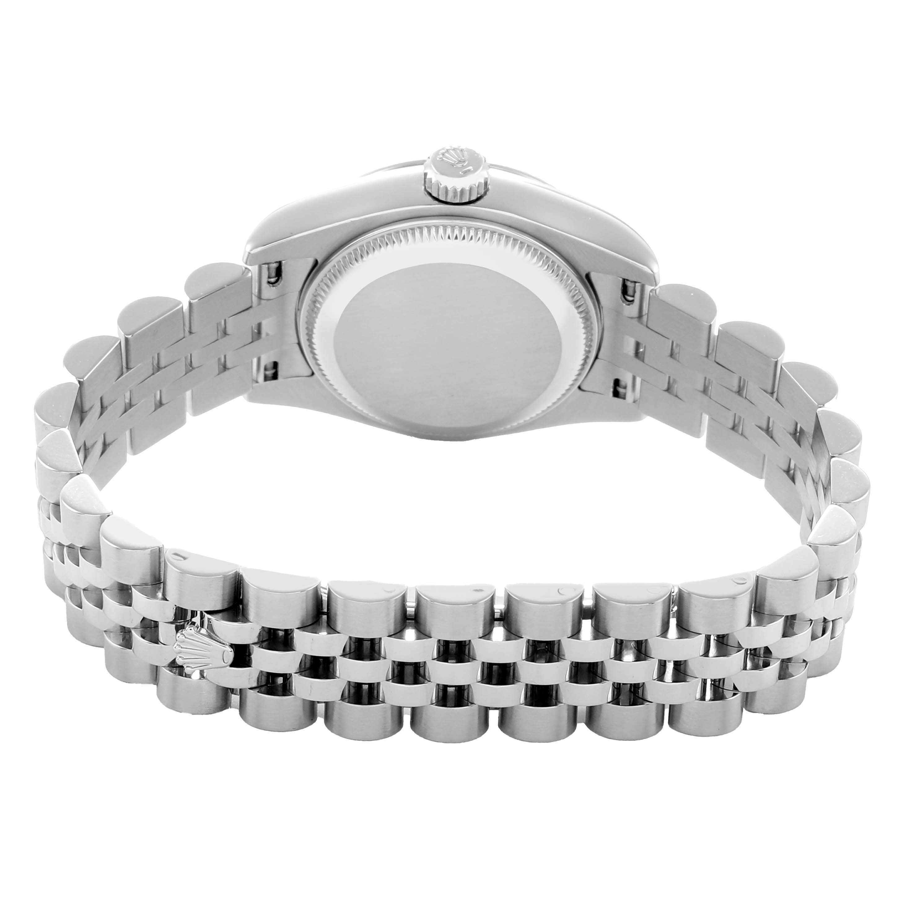 The image shows the back view of a Rolex Datejust 179174 Women
s Stainless Steel Silver Dial, highlighting its case back, crown, and Jubilee bracelet.
