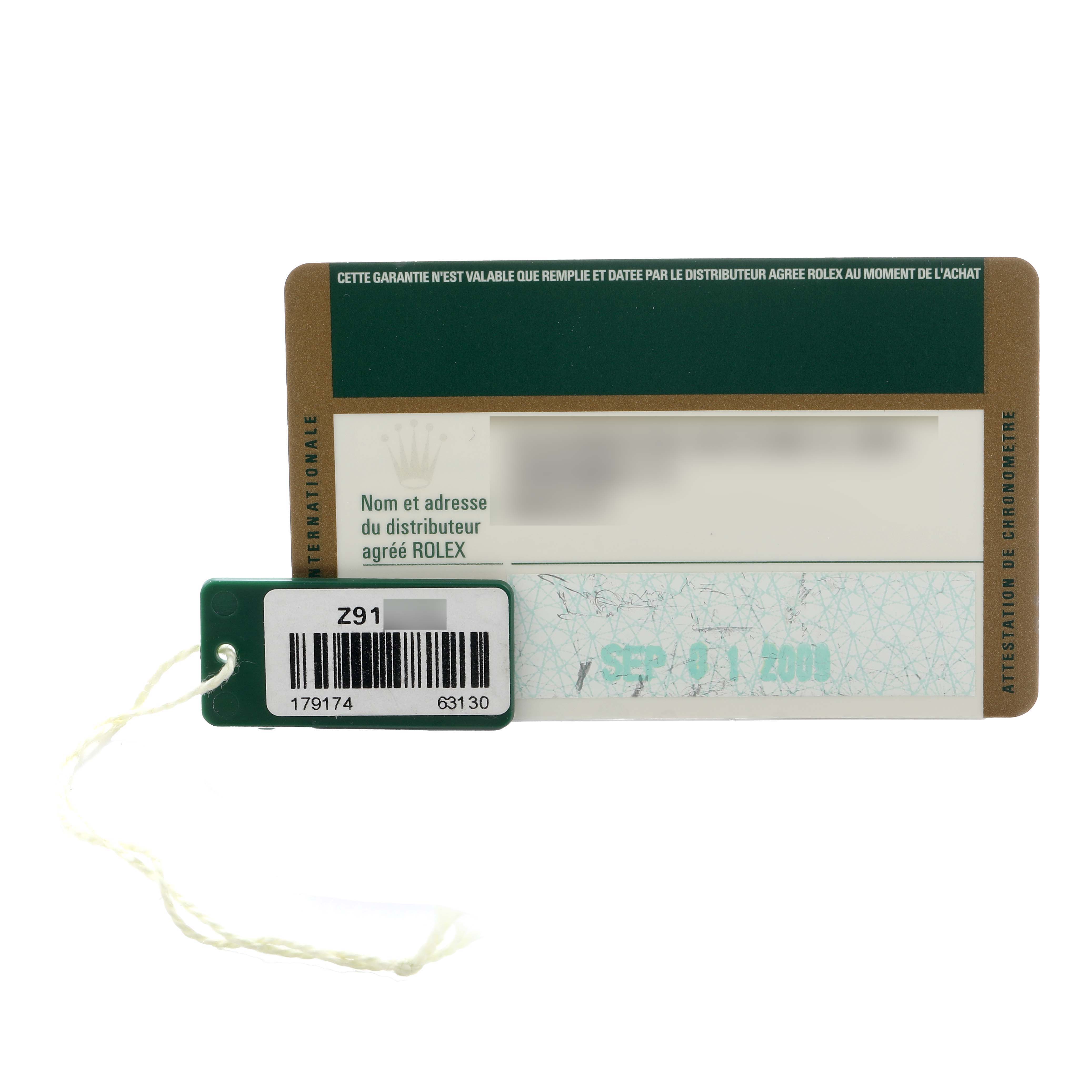 The image shows a Rolex Datejust 179174 Women
s Stainless Steel Silver Dial model warranty card and tag from a front angle.