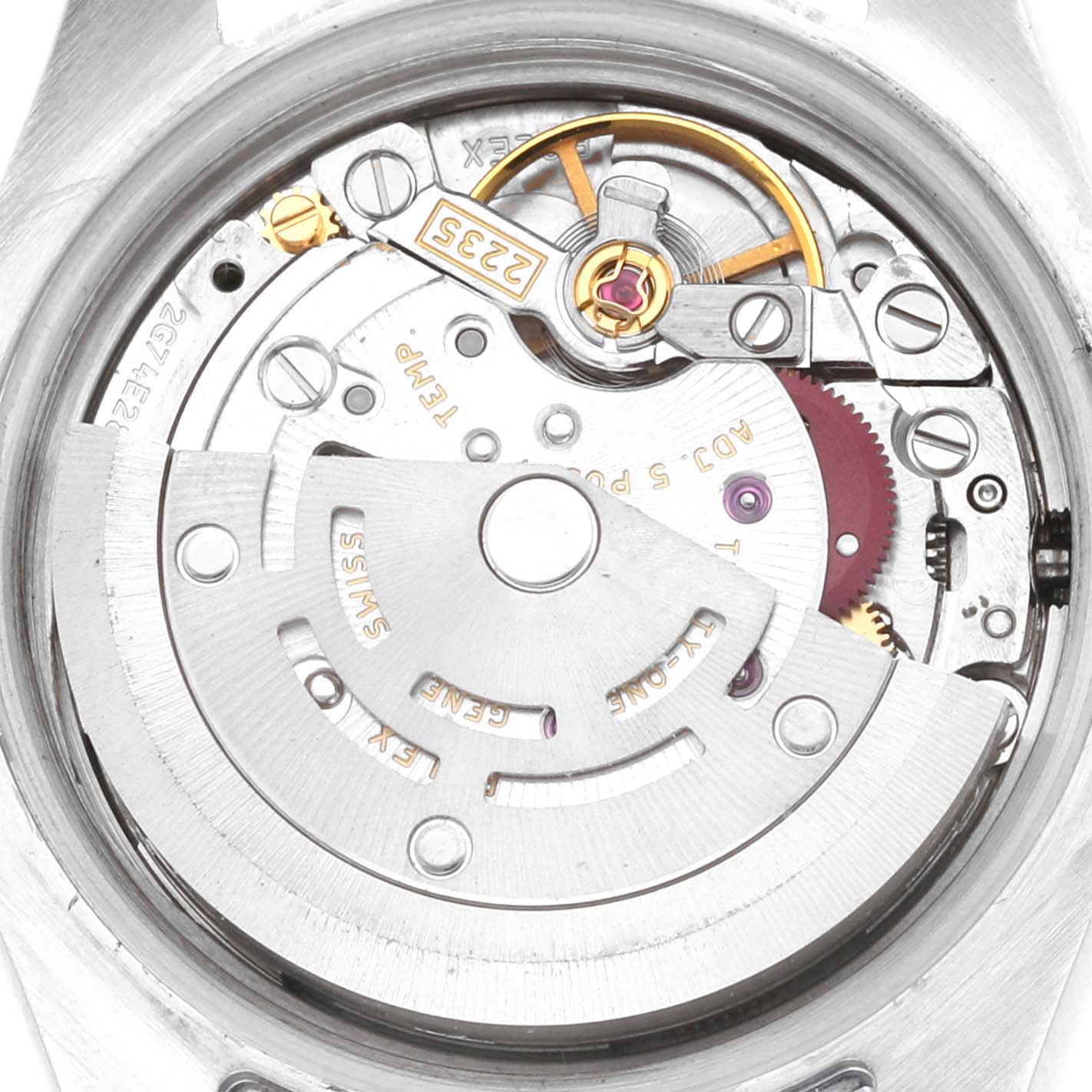 The image shows the internal mechanism and movement of a Rolex Datejust 179384 Women
s Stainless Steel Silver Dial watch viewed from the back.