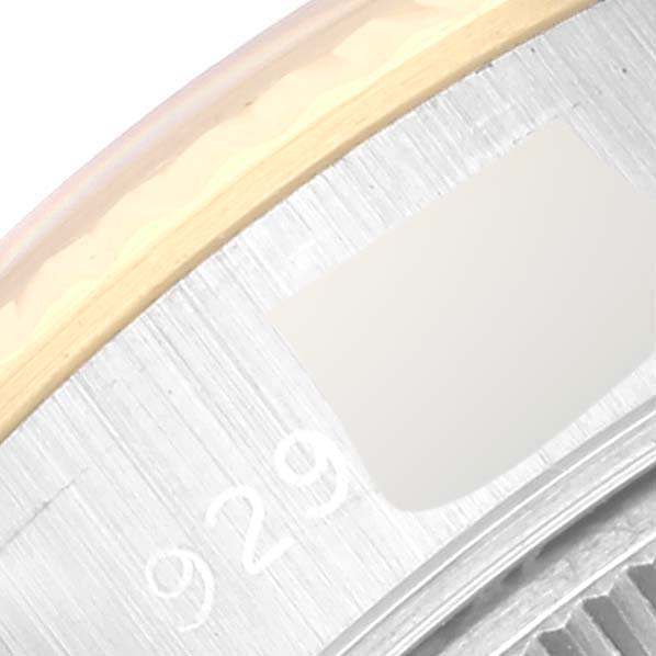 This image shows a close-up of the side and edge of the bezel of a Rolex Datejust 69173 Women's Steel and Gold (two tone) Blue Dial 69173 Women's Steel and Gold (two tone) Blue Dial watch.