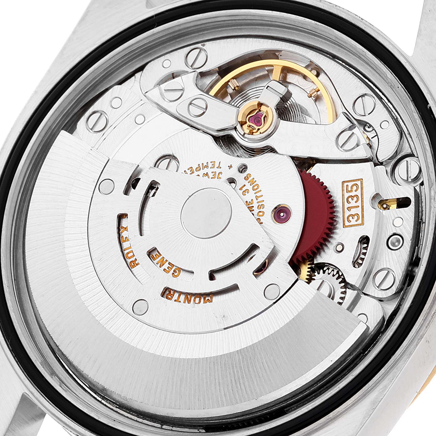 This image shows a close-up view of the movement mechanism in a Rolex Datejust 16233 Men's Steel and Gold (two tone) Champagne Dial 16233 Men's Steel and Gold (two tone) Champagne Dial watch.