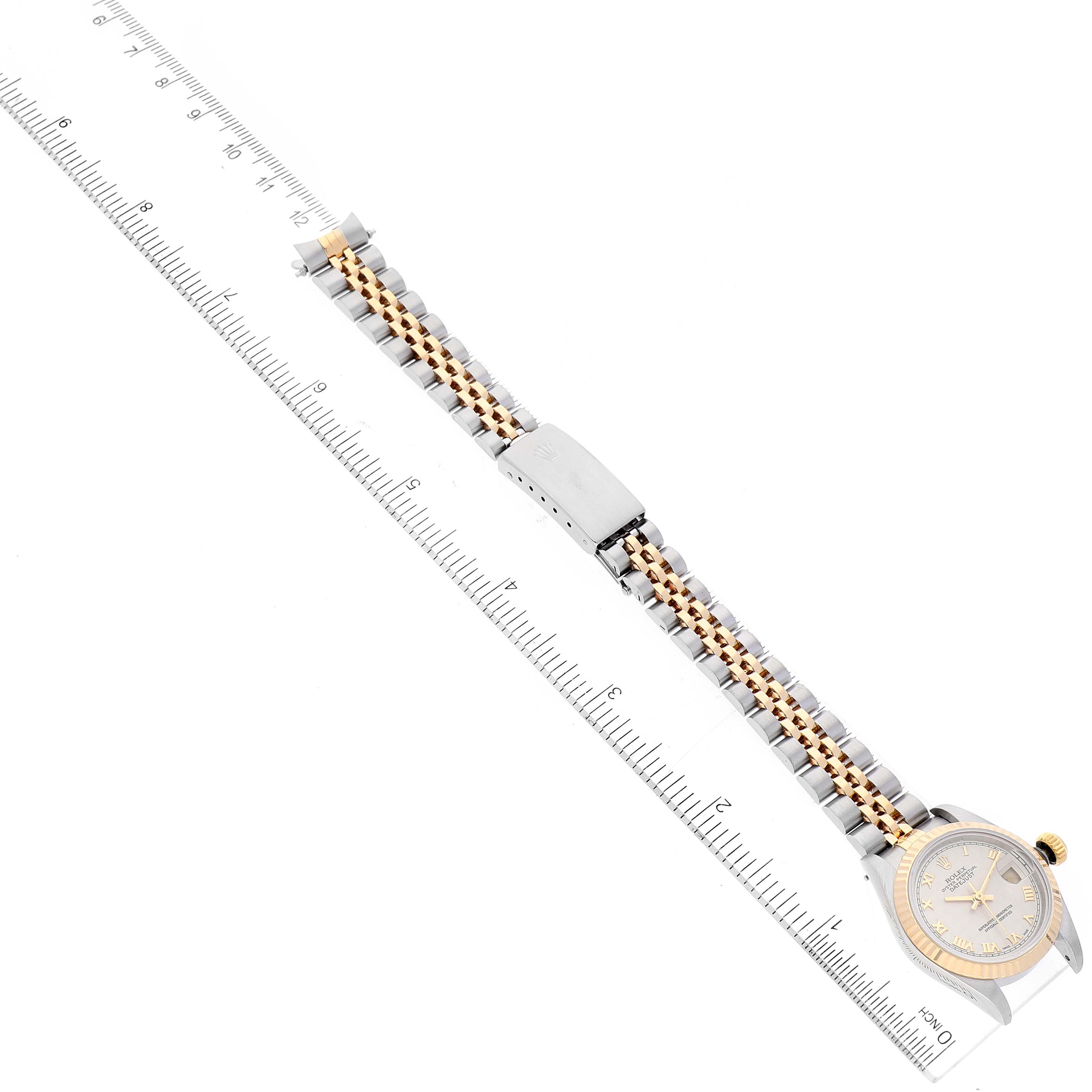The image shows a Rolex Datejust 69173 Women's Steel and Gold (two tone) Beige Dial 69173 Women's Steel and Gold (two tone) Beige Dial watch, including the face, bezel, and bracelet, aligned with a ruler for measurement.