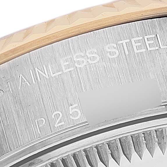 This close-up image of the Rolex Datejust 79173 Women's Steel and Gold (two tone) Silver Dial 79173 Women's Steel and Gold (two tone) Silver Dial shows part of the case back and the engraved "STAINLESS STEEL" text.