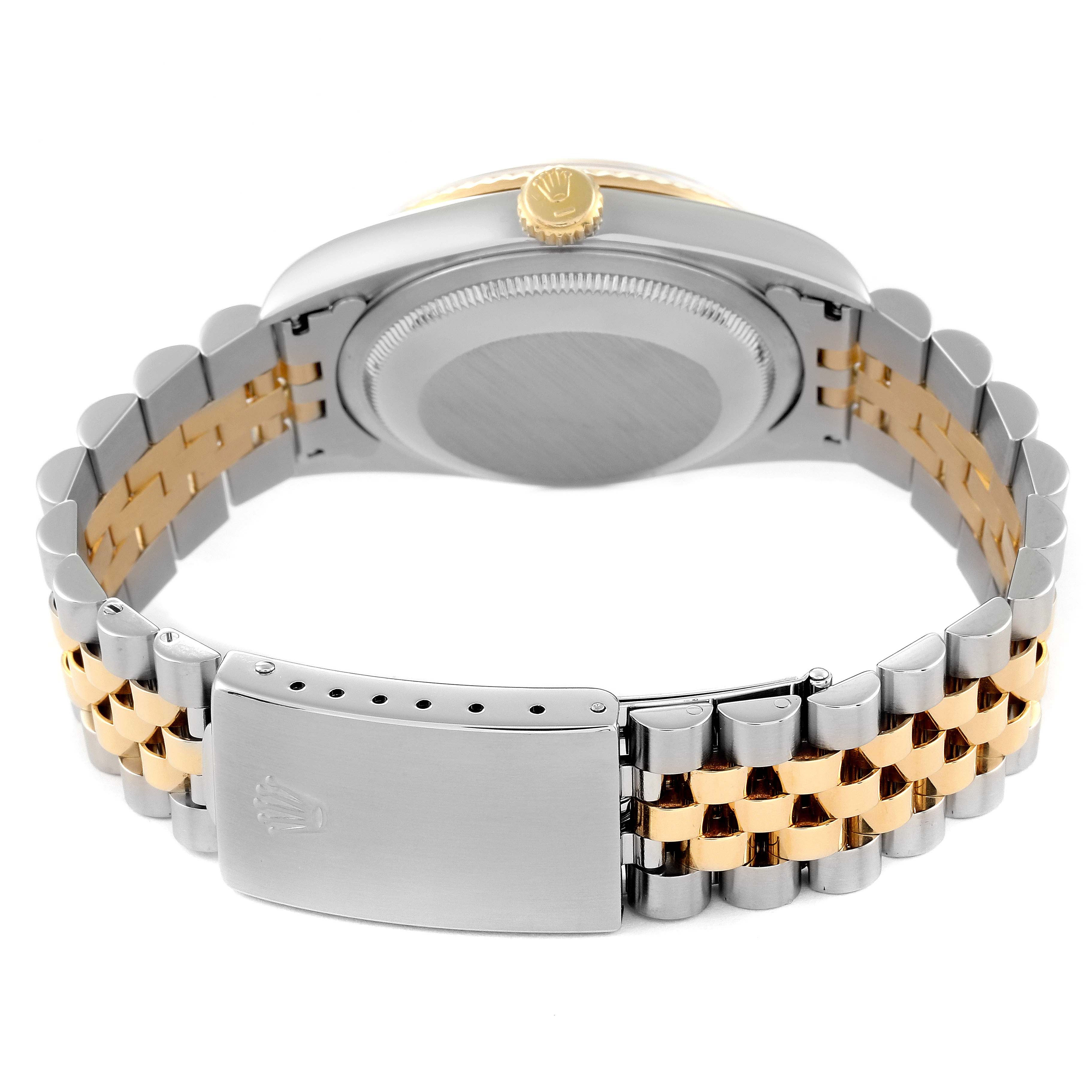 This shows the back view of the Rolex Datejust 16233 Men's Steel and Gold (two tone) White Dial 16233 Men's Steel and Gold (two tone) White Dial watch, highlighting its case and two-tone bracelet with clasp.