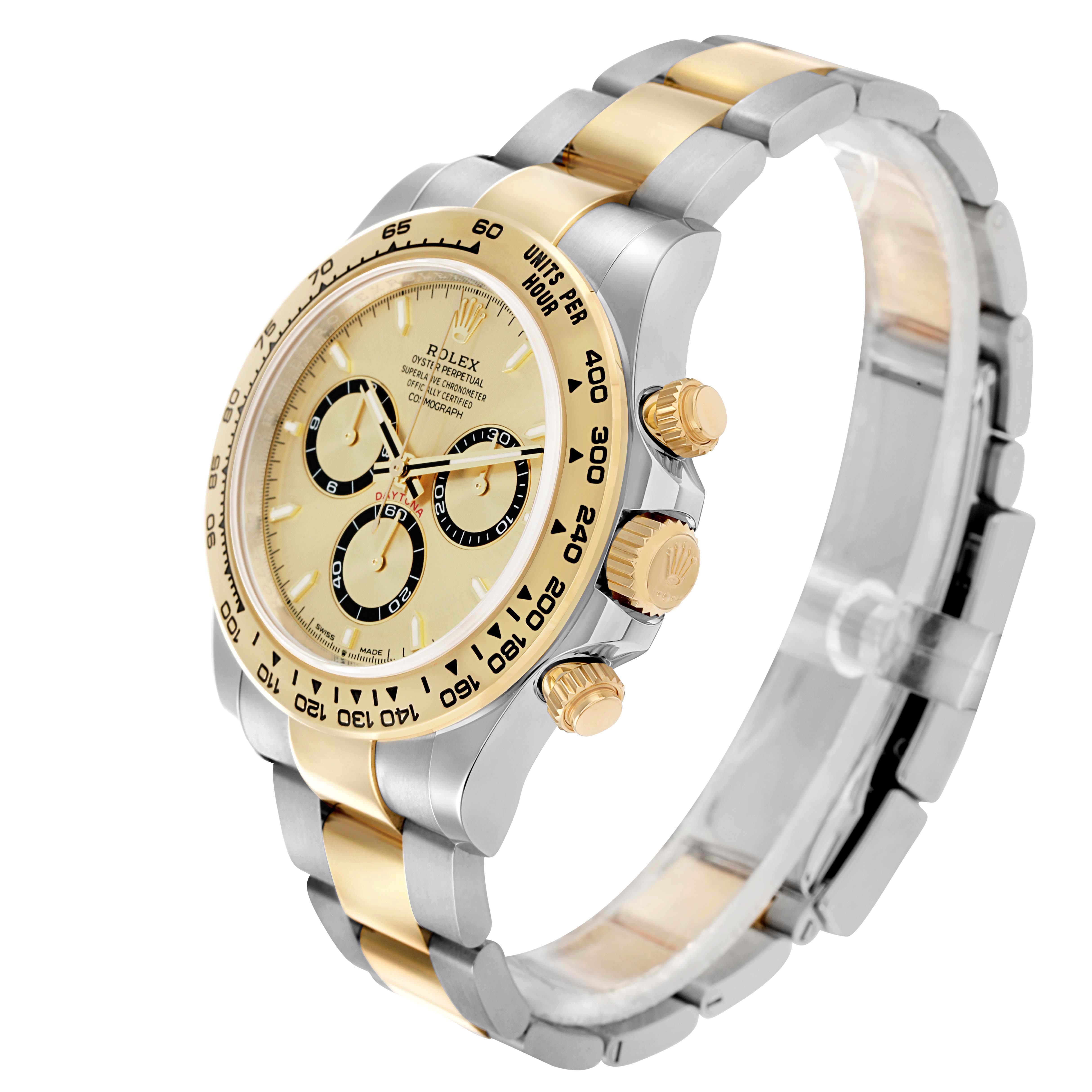 The Rolex Daytona 126503 Men
s Steel and Gold (two tone) Champagne Dial is shown at an angled view, displaying the watch face, bezel, pushers, and two-tone bracelet.