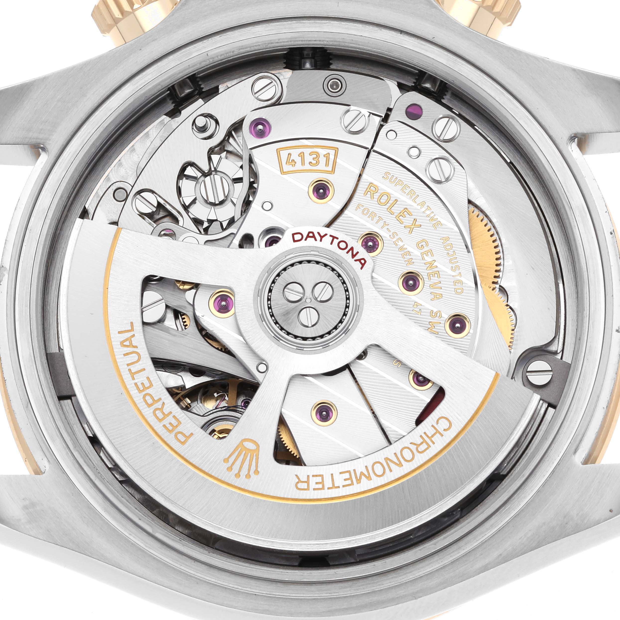 The image shows the movement and rotor of a Rolex Daytona 126503 Men
s Steel and Gold (two tone) Champagne Dial watch from a rear angle.