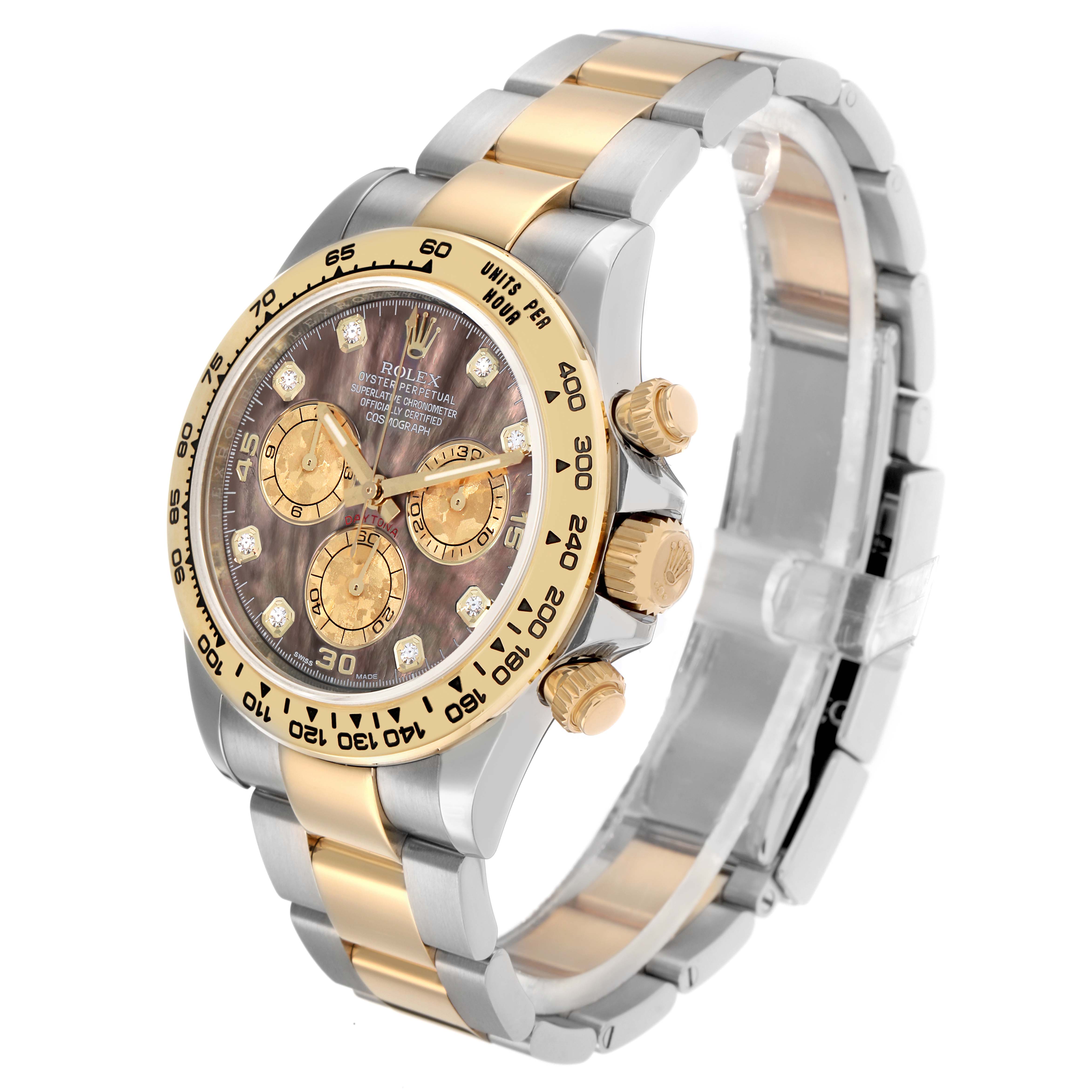 The Rolex Daytona 116503 Men
s Steel and Gold (two tone) Mother of Pearl Dial watch is shown at a three-quarter angle, highlighting the bezel, dial, pushers, and two-tone bracelet.