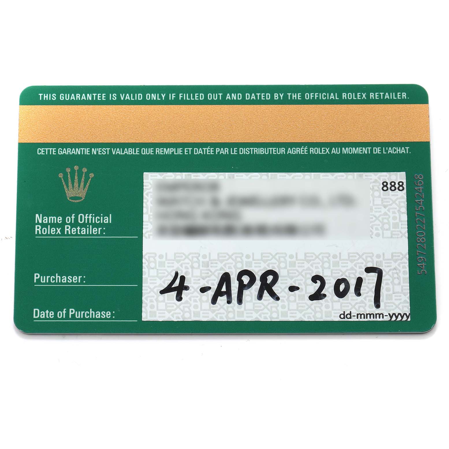 The image shows a guarantee card for a Rolex Daytona 116503 Men
s Steel and Gold (two tone) Mother of Pearl Dial, viewed from above.