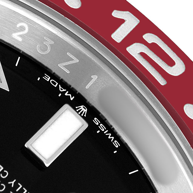 The image shows a close-up of the bezel and partial dial of a Rolex GMT-Master 126710BLRO Men's Stainless Steel Black Dial, highlighting the numbers and a marker.