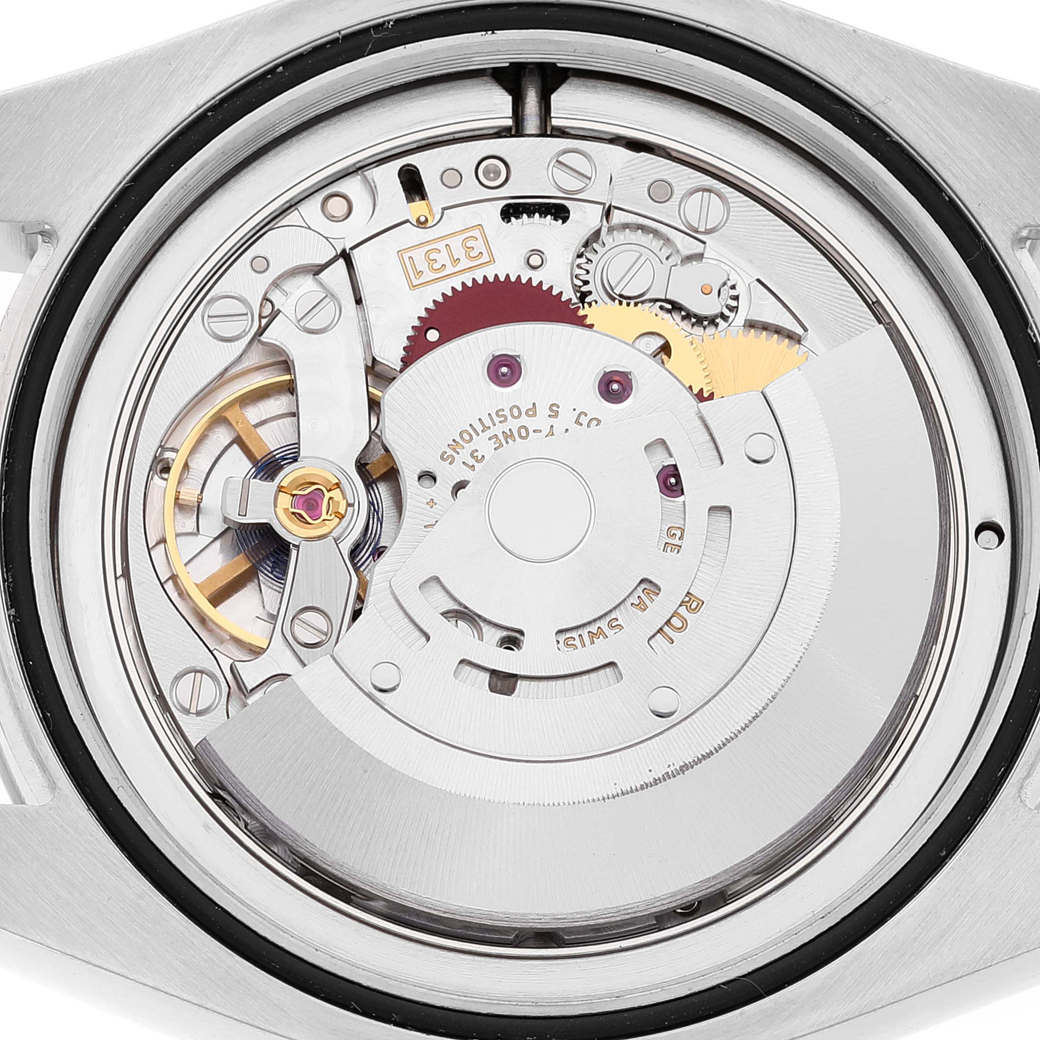 The image shows the movement and internal mechanism of a Rolex Milgauss 116400GV Men
s Stainless Steel Blue Dial 116400GV Men
s Stainless Steel Blue Dial watch from a backside angle.