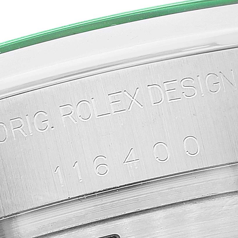 This image shows a close-up view of the engraving on the side of a Rolex Milgauss 116400GV Men
s Stainless Steel Blue Dial 116400GV Men
s Stainless Steel Blue Dial model, displaying "ORIG. ROLEX DESIGN" and the model number "116400."