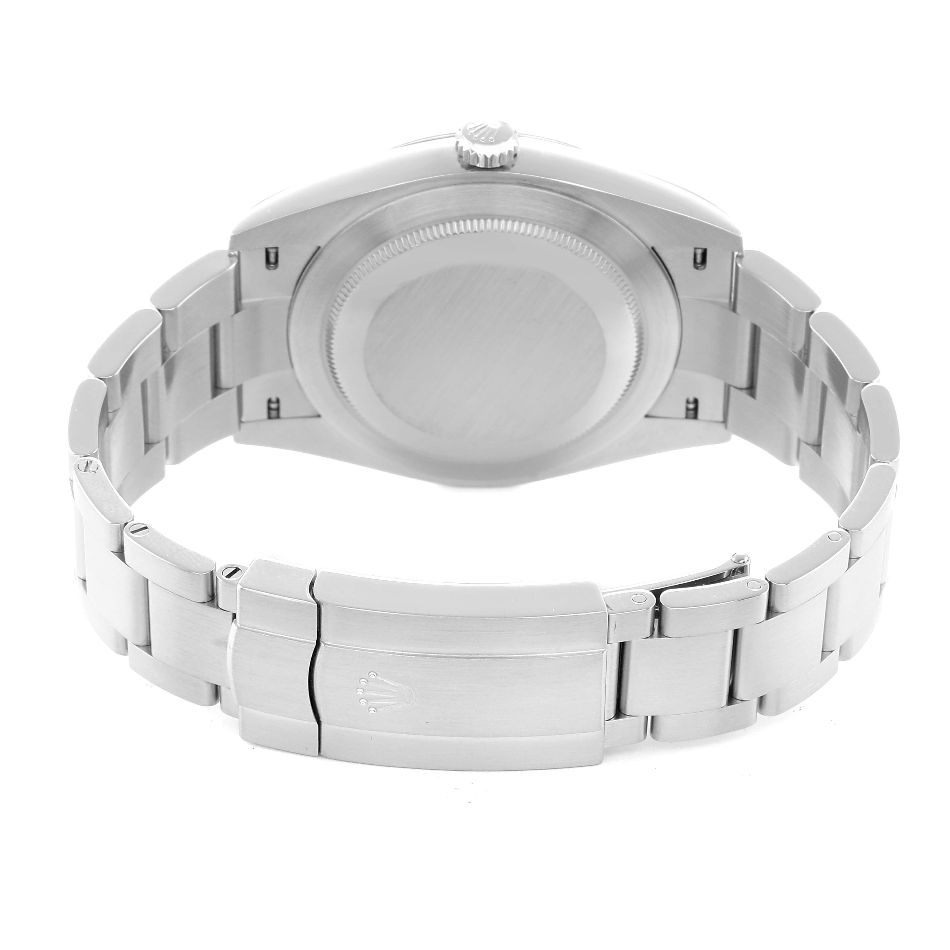 The image shows the back view of a Rolex Oyster Perpetual 124300 Men
s Stainless Steel Black Dial, highlighting the case back and bracelet clasp.