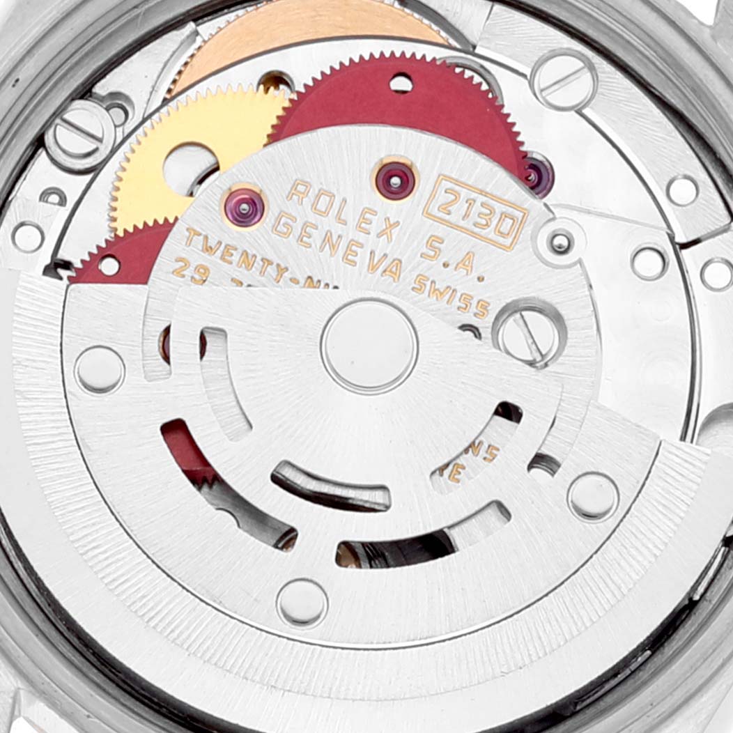 This close-up image shows the internal mechanism and rotor of the Rolex Oyster Perpetual 67193 Women's Steel and Gold (two tone) Champagne Dial 67193 Women's Steel and Gold (two tone) Champagne Dial watch model.