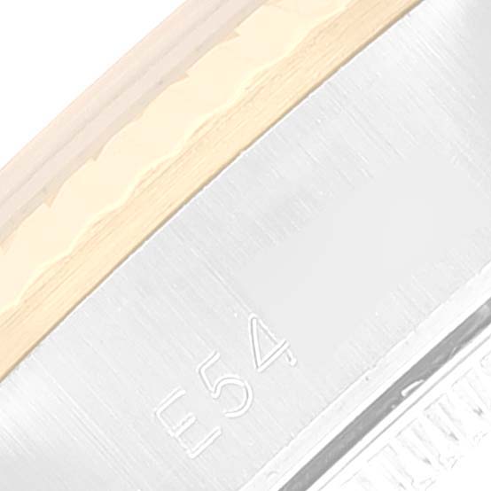 This is a close-up of an Oyster Perpetual Rolex watch case, showing the side with engraved markings.