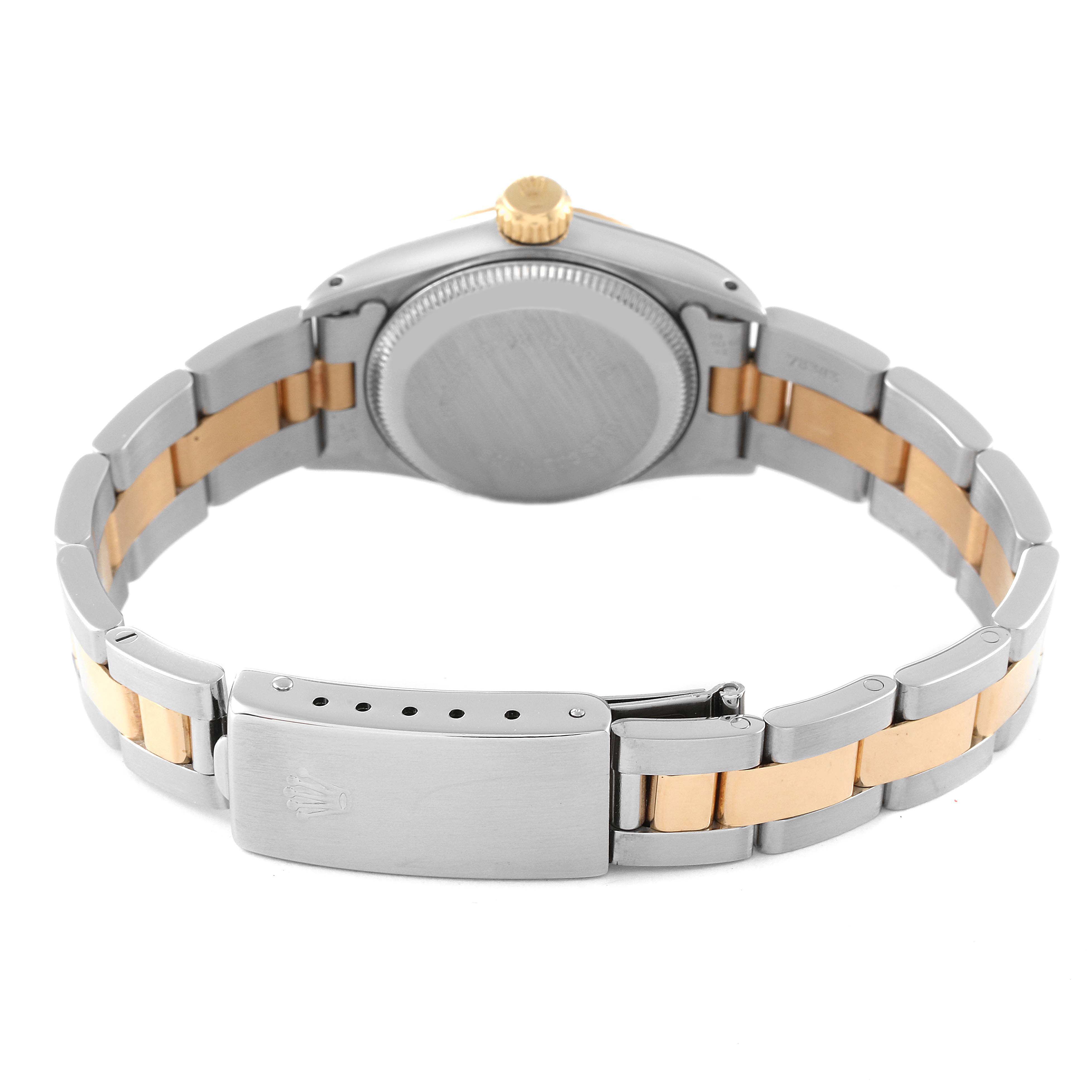 The image shows the back view of the Rolex Oyster Perpetual 67193 Women's Steel and Gold (two tone) Champagne Dial 67193 Women's Steel and Gold (two tone) Champagne Dial watch, highlighting the case back and the clasp of the bracelet.