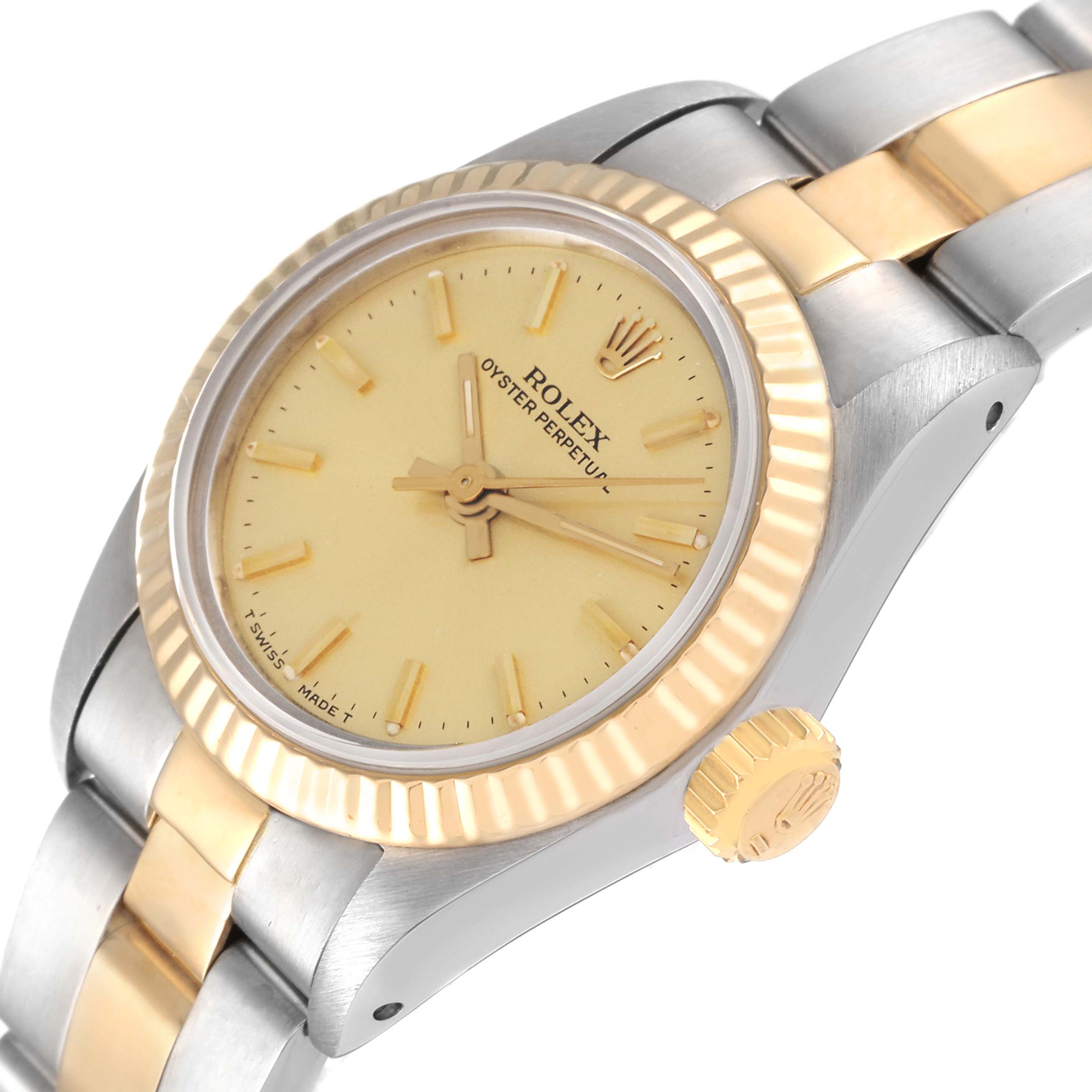 This image shows a close-up, angled view of the Rolex Oyster Perpetual 67193 Women
s Steel and Gold (two tone) Champagne Dial 67193 Women
s Steel and Gold (two tone) Champagne Dial watch, highlighting its bezel, dial, crown, and bracelet.