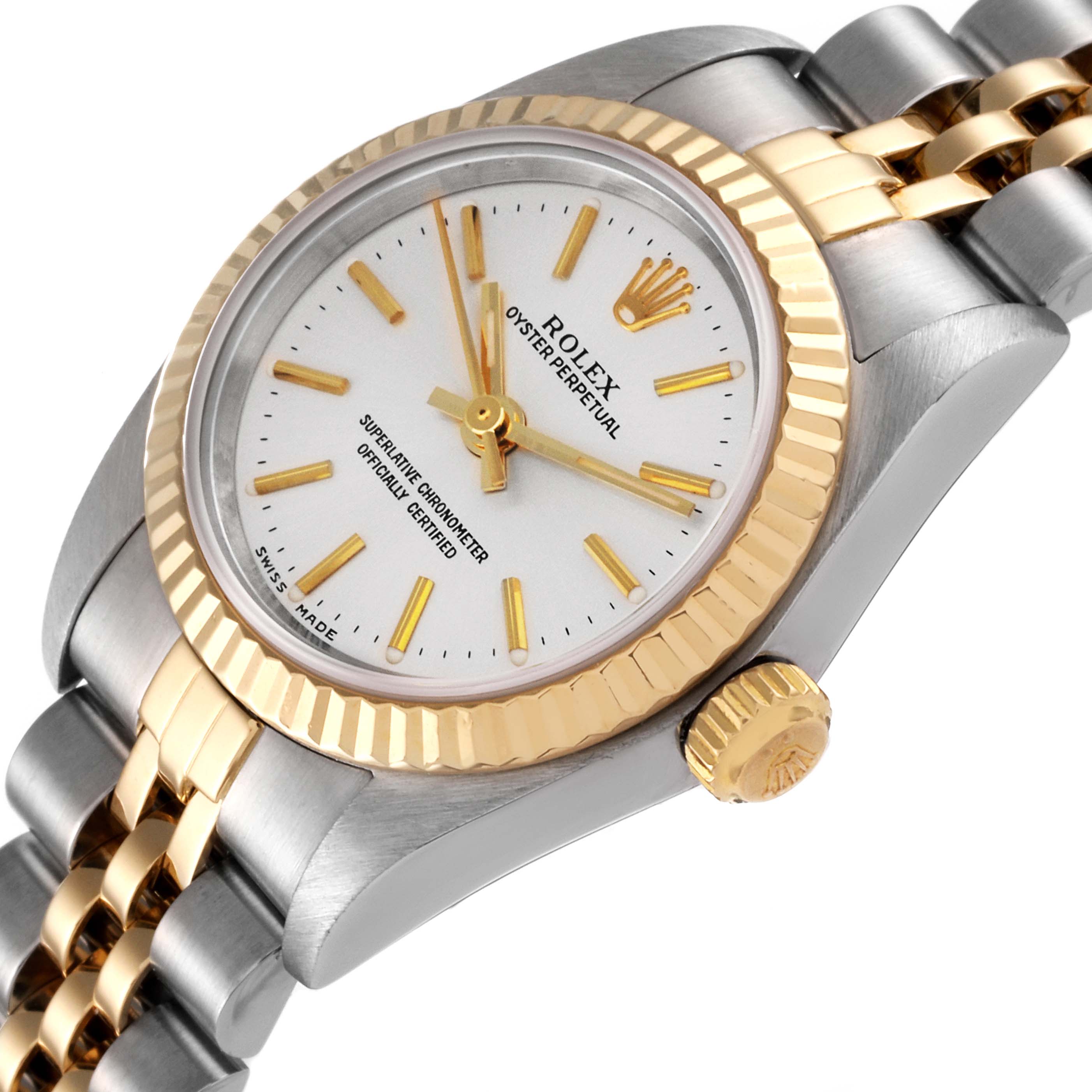 This image shows a close-up angle of a Rolex Oyster Perpetual 76193 Women's Steel and Gold (two tone) Silver Dial 76193 Women's Steel and Gold (two tone) Silver Dial watch, highlighting the dial, crown, and part of the bracelet.