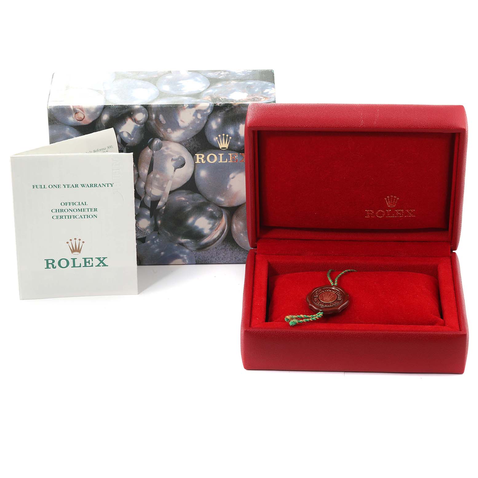 The image shows the packaging, warranty booklet, empty red storage box, and tag for a Rolex Oyster Perpetual 76193 Women's Steel and Gold (two tone) Silver Dial 76193 Women's Steel and Gold (two tone) Silver Dial watch.