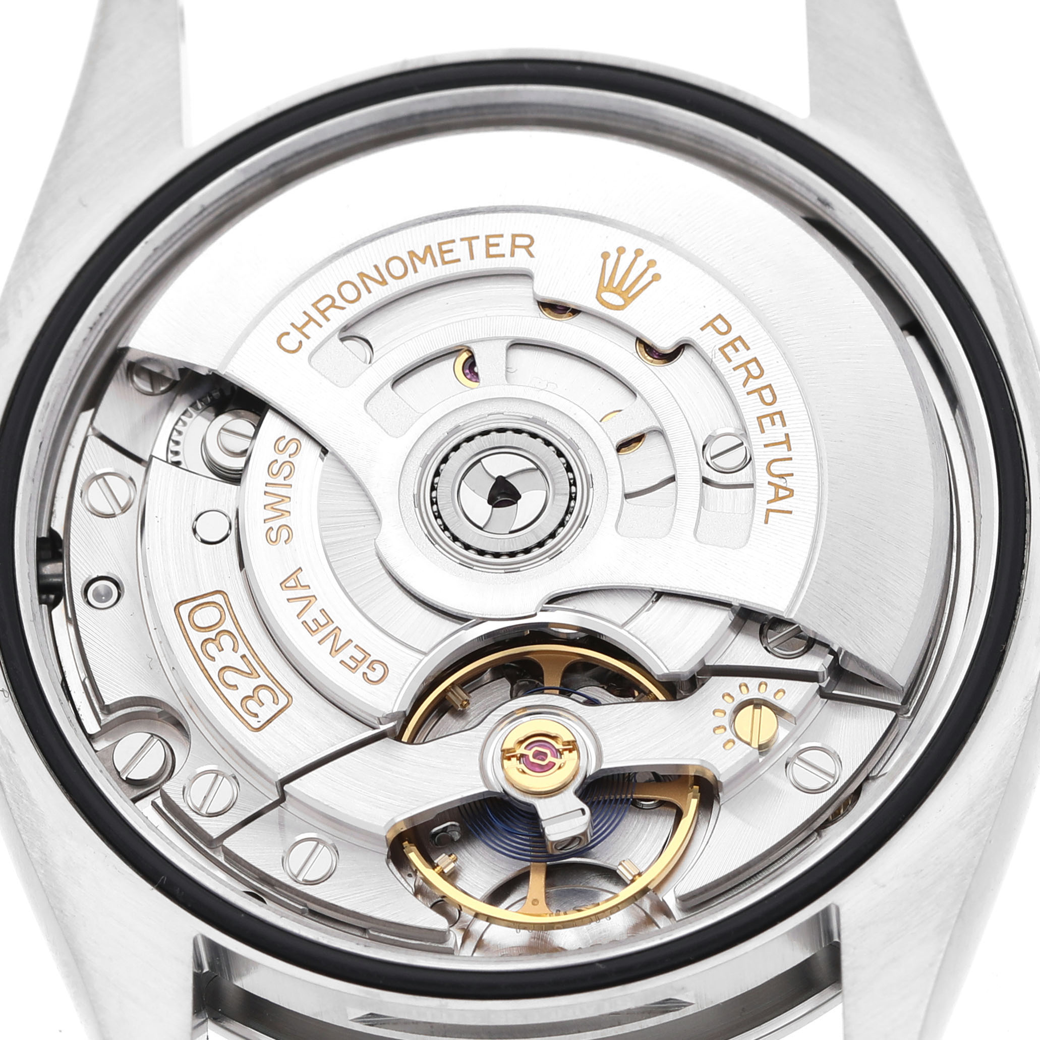 The image shows the back view of a Rolex Oyster Perpetual 126000 Men's Stainless Steel Blue Dial, highlighting its movement and rotor.