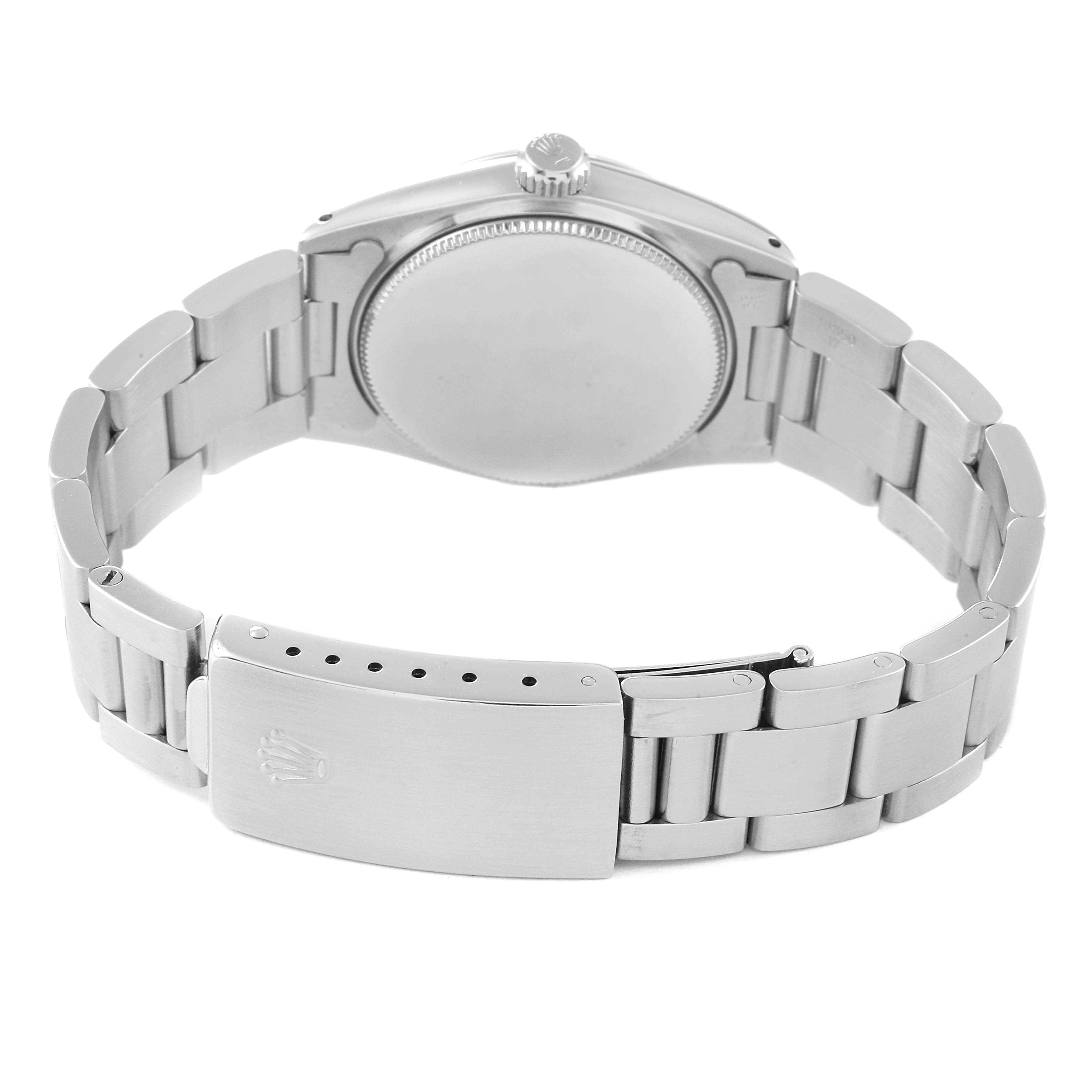 The image shows the back side and clasp of a Mid-Size Rolex watch with a detailed view of the bracelet and case back.