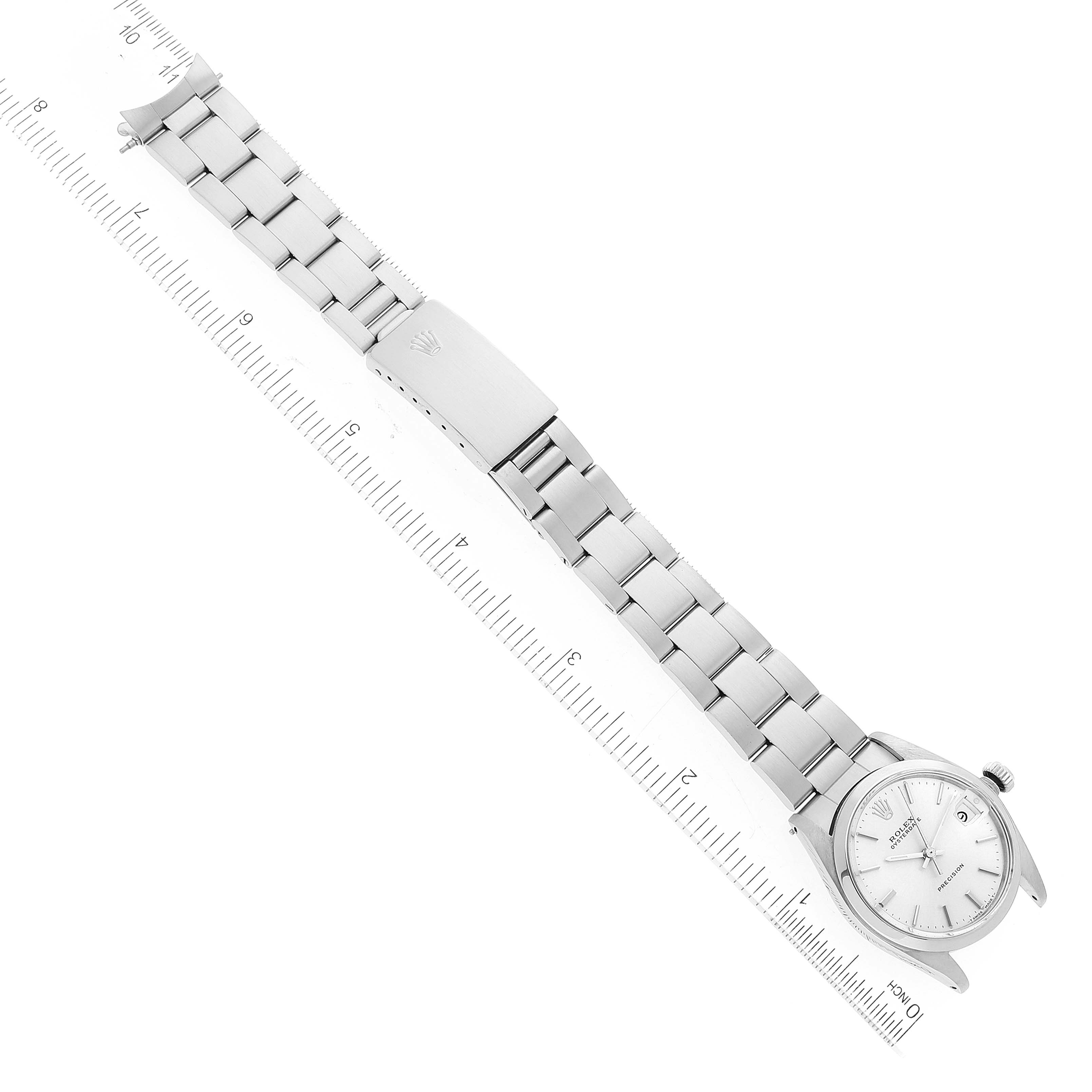 The image displays a Mid-Size Rolex watch at a diagonal angle, showing the full band and face next to a measurement ruler.