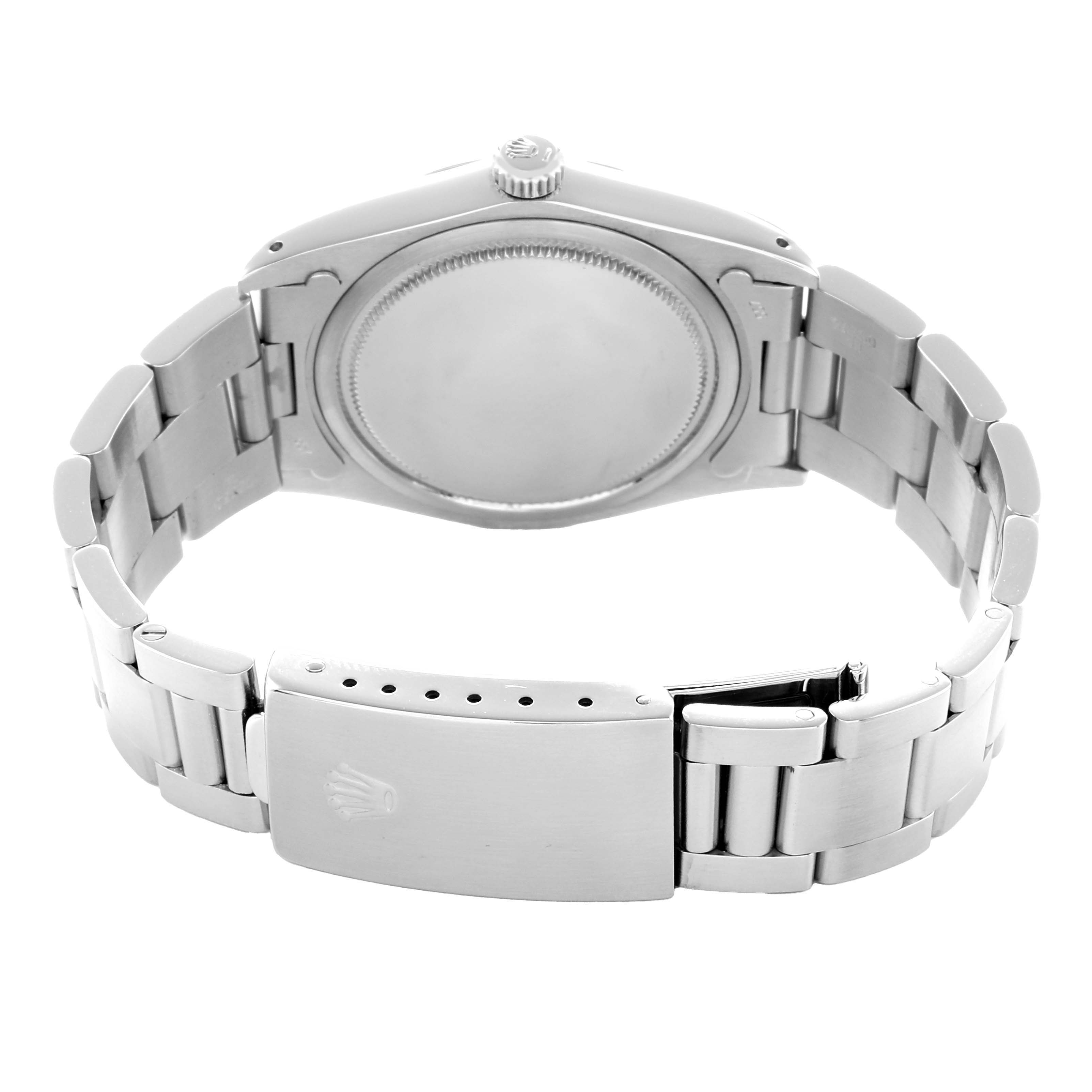 The back view of the Rolex Vintage Collection 6694 Men
s Stainless Steel Black Dial watch shows the case back, bracelet, and clasp.