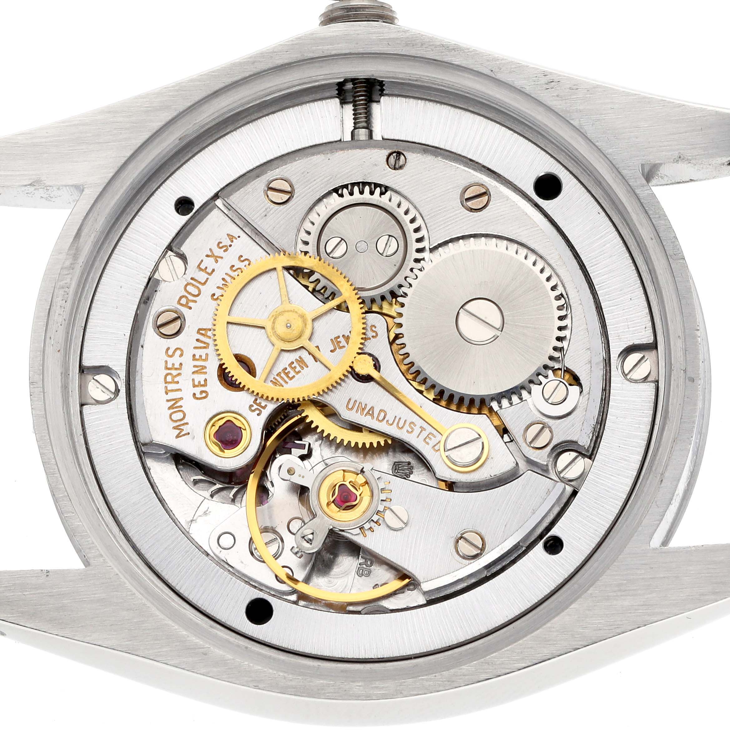 The image shows the Rolex Vintage Collection 6694 Men
s Stainless Steel Black Dial watch from the back, highlighting its intricate mechanical movement and gears.