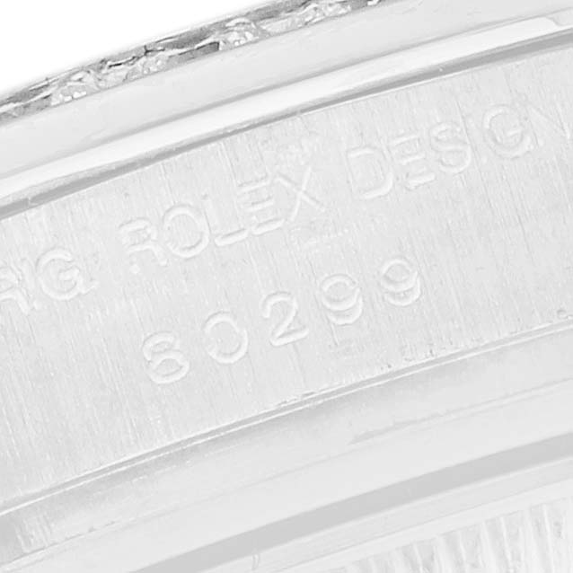 The image shows a close-up of the Rolex Pearlmaster 80299 Women
s White Gold Mother of Pearl Dial
s case side with engraved model details.