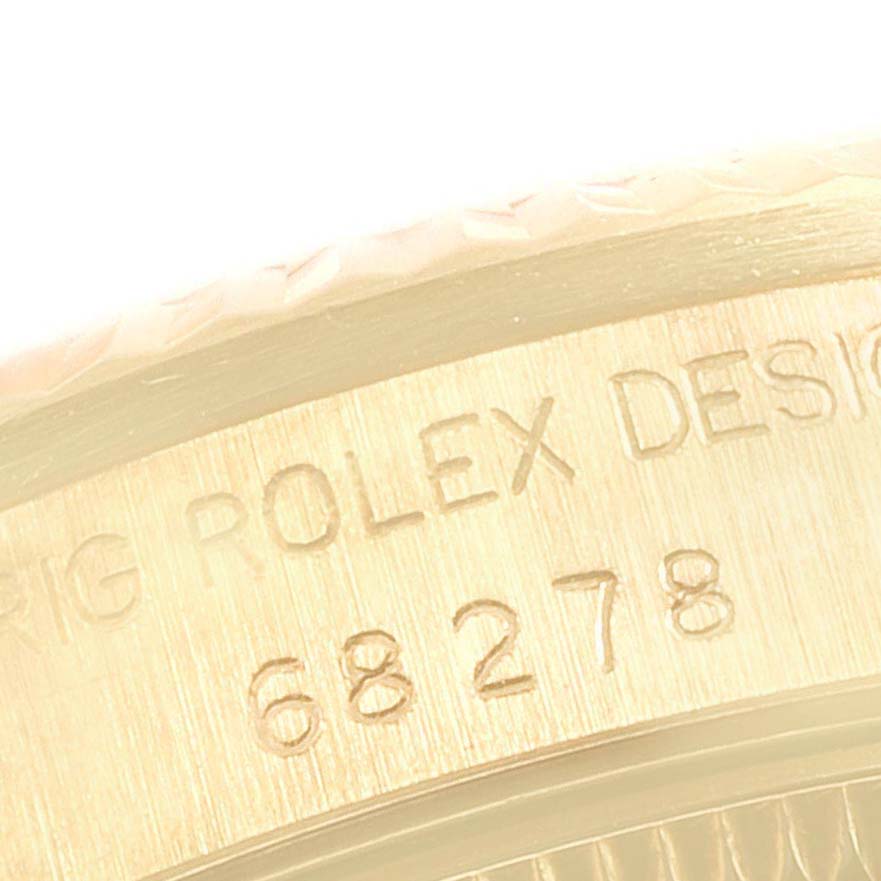 The image shows a close-up of the side engraving with the model number on the Rolex President 68278 Women's Yellow Gold Champagne Dial 68278 Women's Yellow Gold Champagne Dial watch.