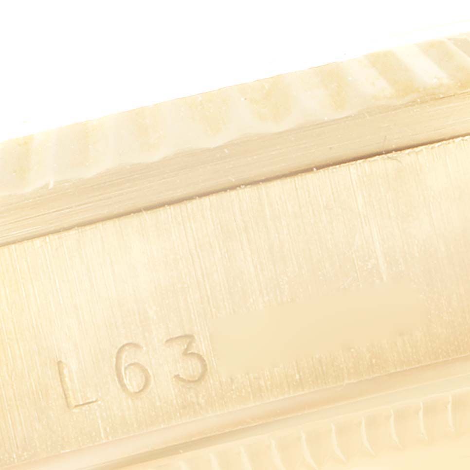 The image shows a close-up angle of the bezel and case edge, engraved with "L63", of a Rolex President 68278 Women's Yellow Gold Champagne Dial 68278 Women's Yellow Gold Champagne Dial model watch.