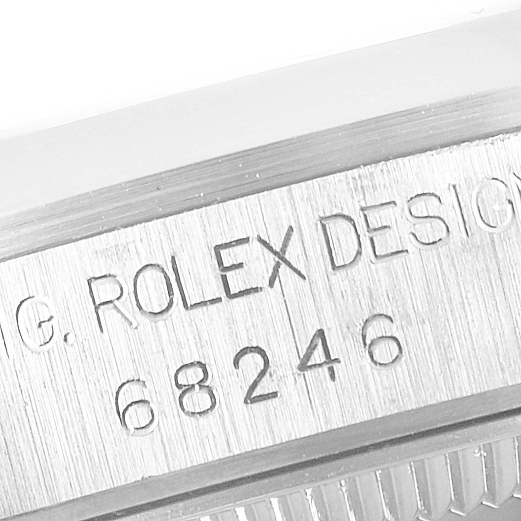 This is a close-up angle showing the model number engraving on the side of a Rolex President 68246 Women's Platinum Black Dial 68246 Women's Platinum Black Dial watch.