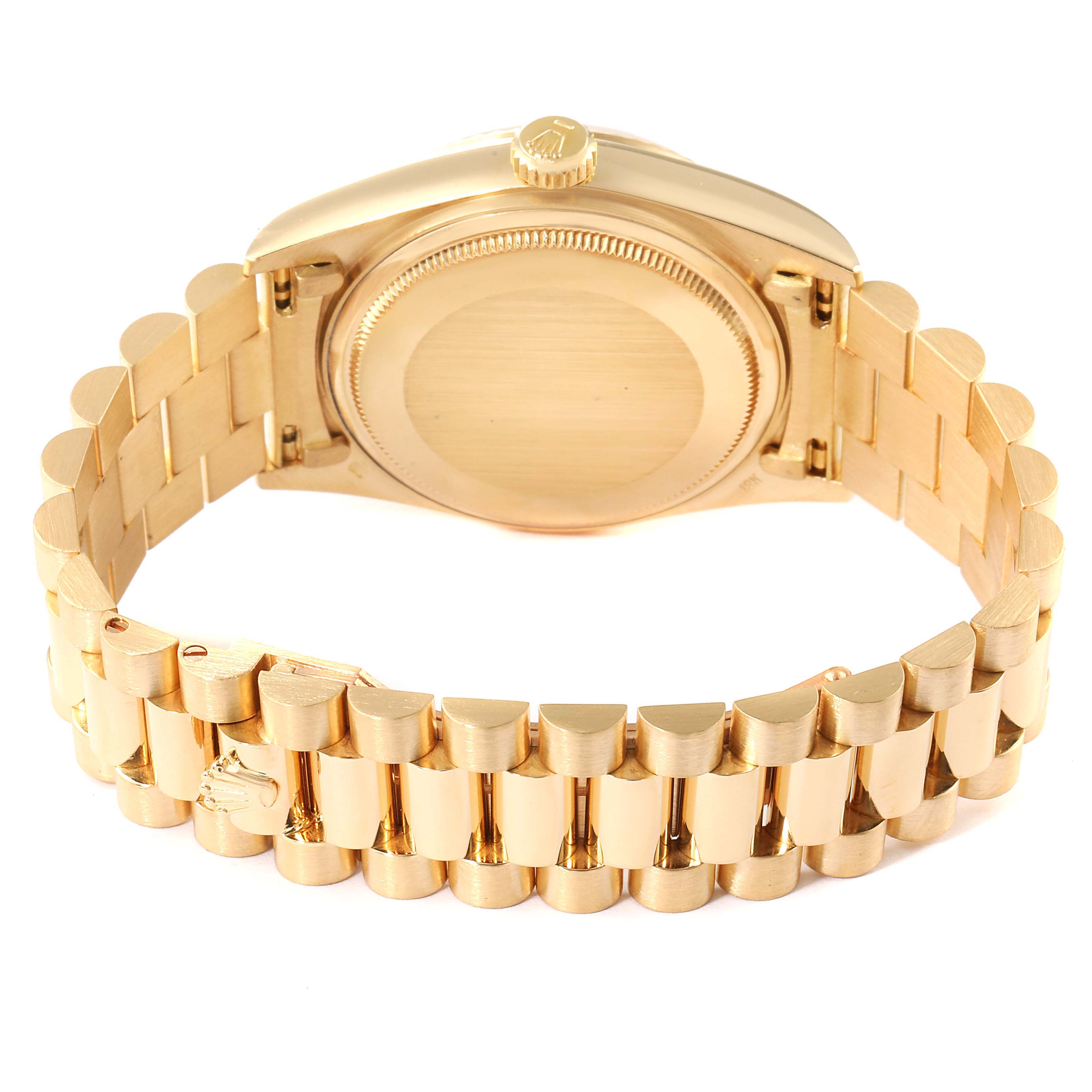 The image shows the back view of a Rolex President 18038 Men
s Yellow Gold Champagne Dial 18038 Men
s Yellow Gold Champagne Dial model watch, highlighting its bracelet and case back.