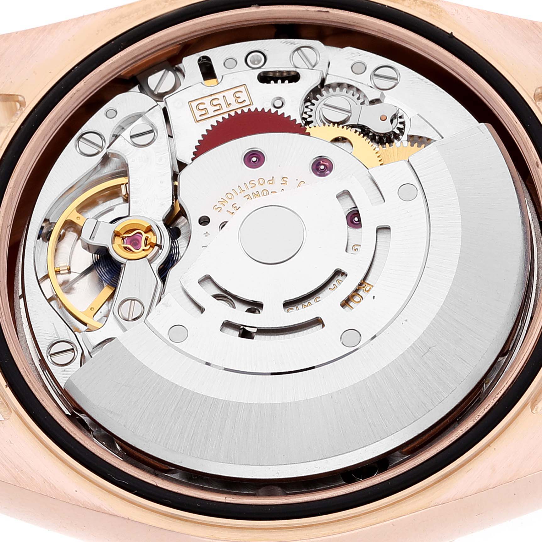 The image shows the intricate inner mechanics of a Rolex President 118235 Men's Rose Gold Pink Dial 118235 Men's Rose Gold Pink Dial model watch from a close-up, top-down angle.